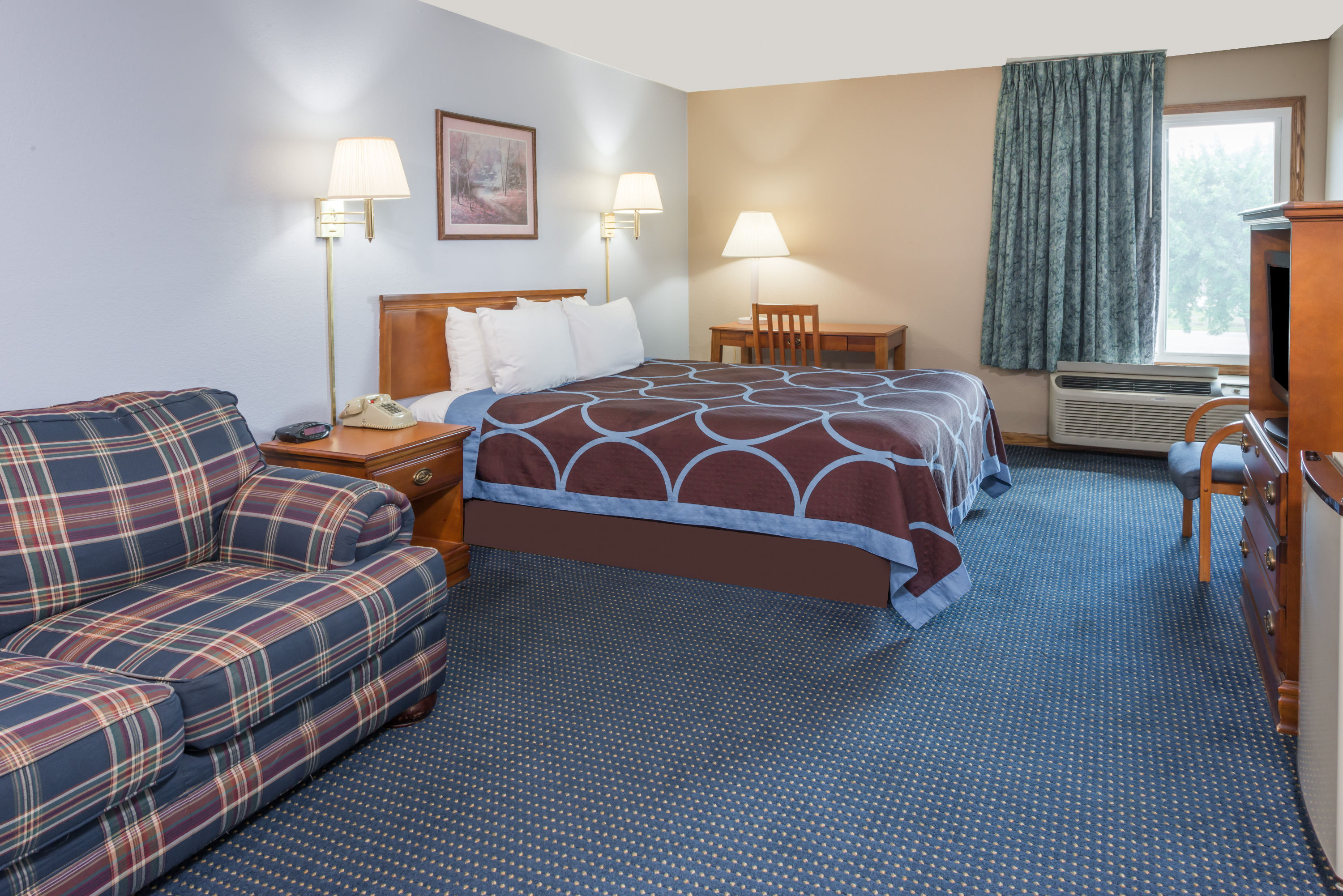 Guest room at the Super 8 by Wyndham O'Fallon MO/St. Louis Area in OFallon, Missouri