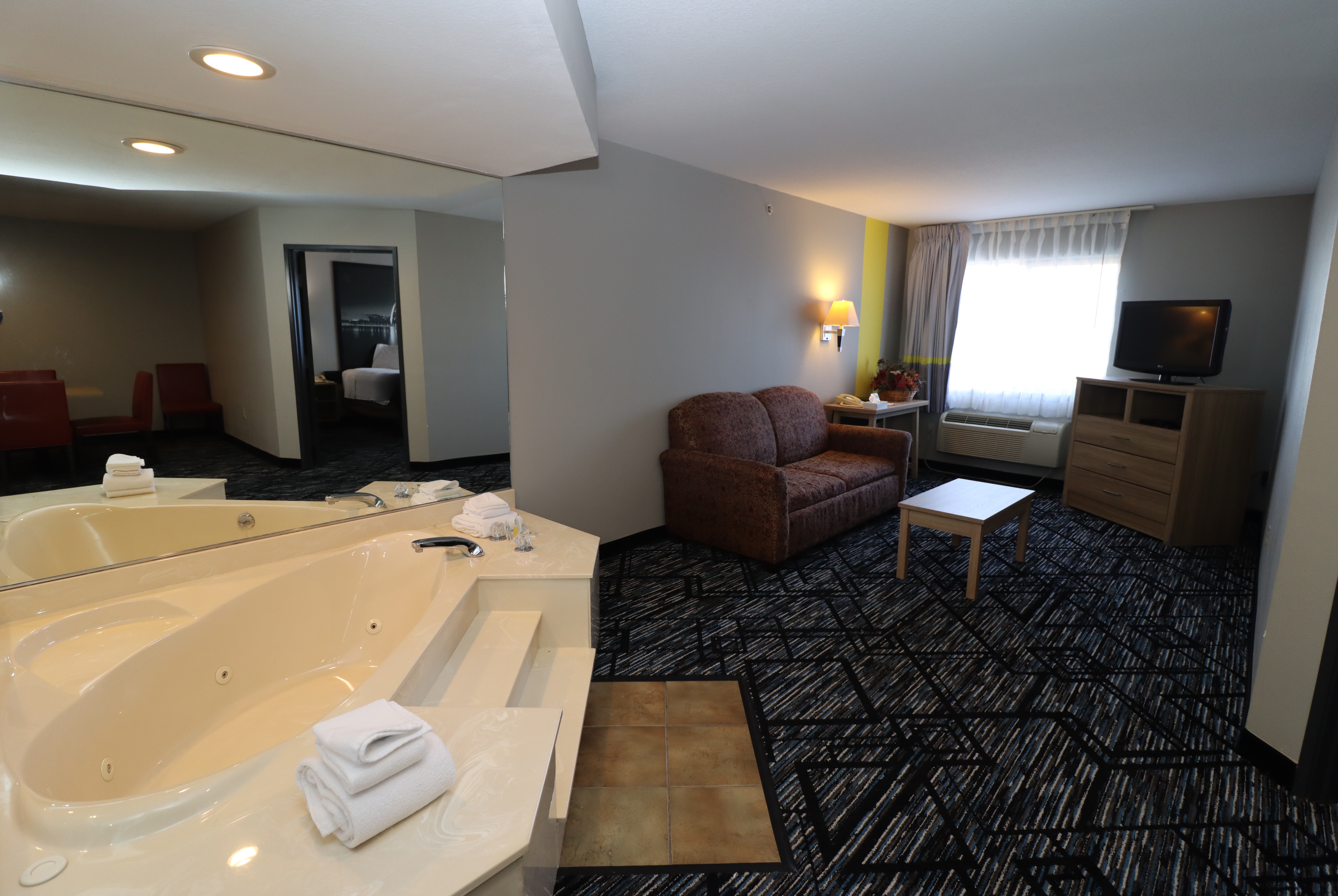 Guest room at the Super 8 by Wyndham Perryville in Perryville, Missouri