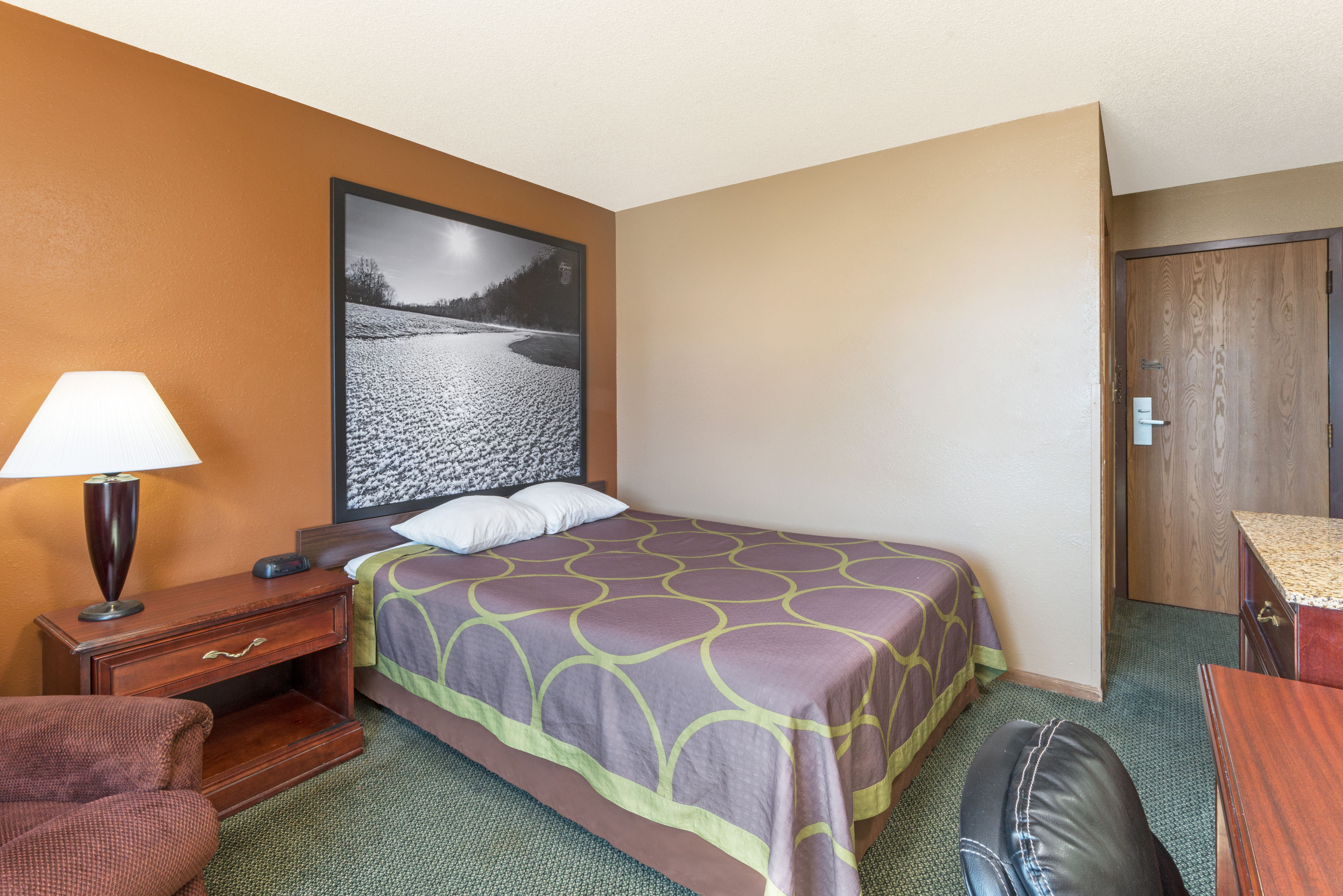 Guest room at the Super 8 by Wyndham Poplar Bluff Missouri in Poplar Bluff, Missouri