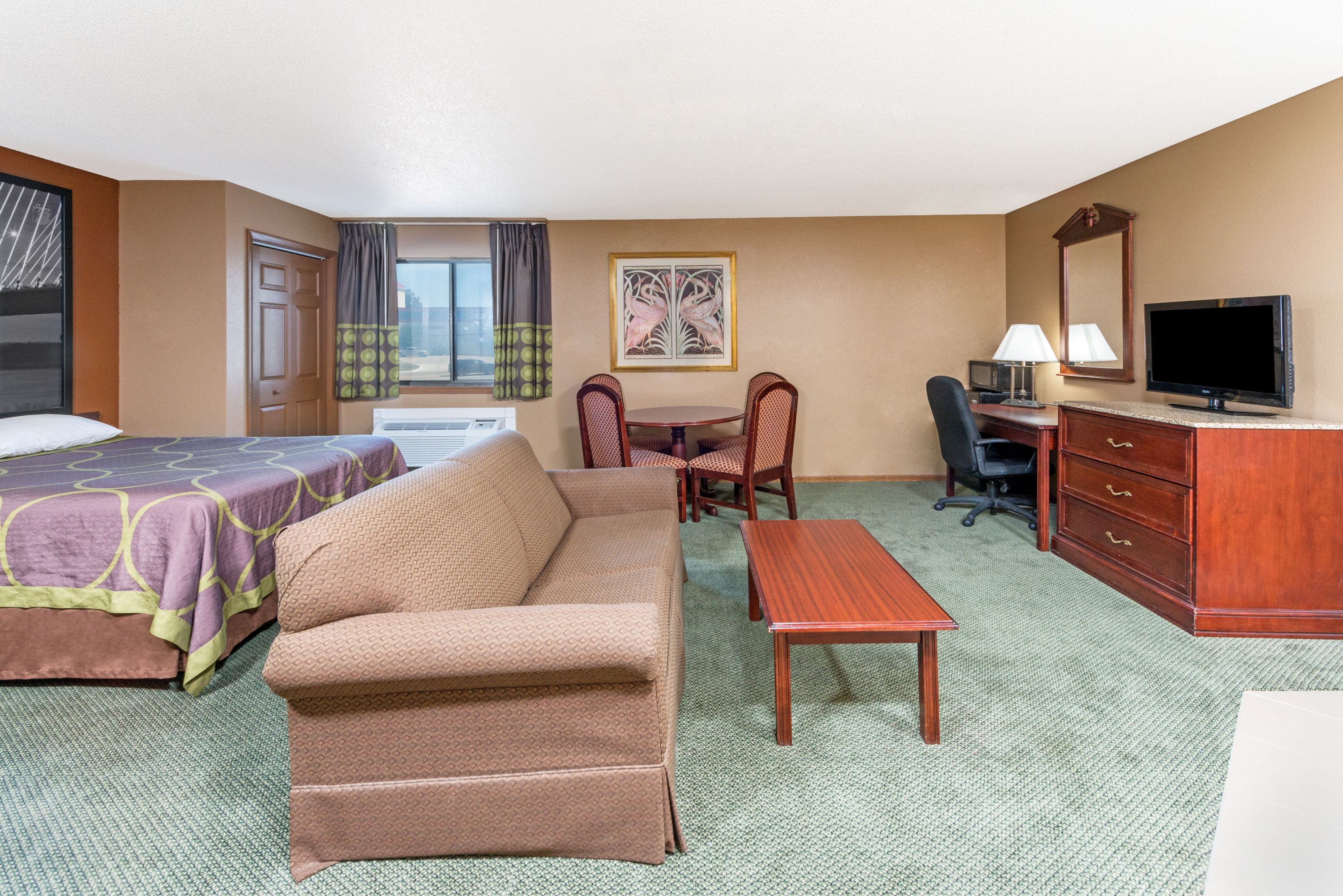 Super 8 by Wyndham Poplar Bluff Missouri suite in Poplar Bluff, Missouri