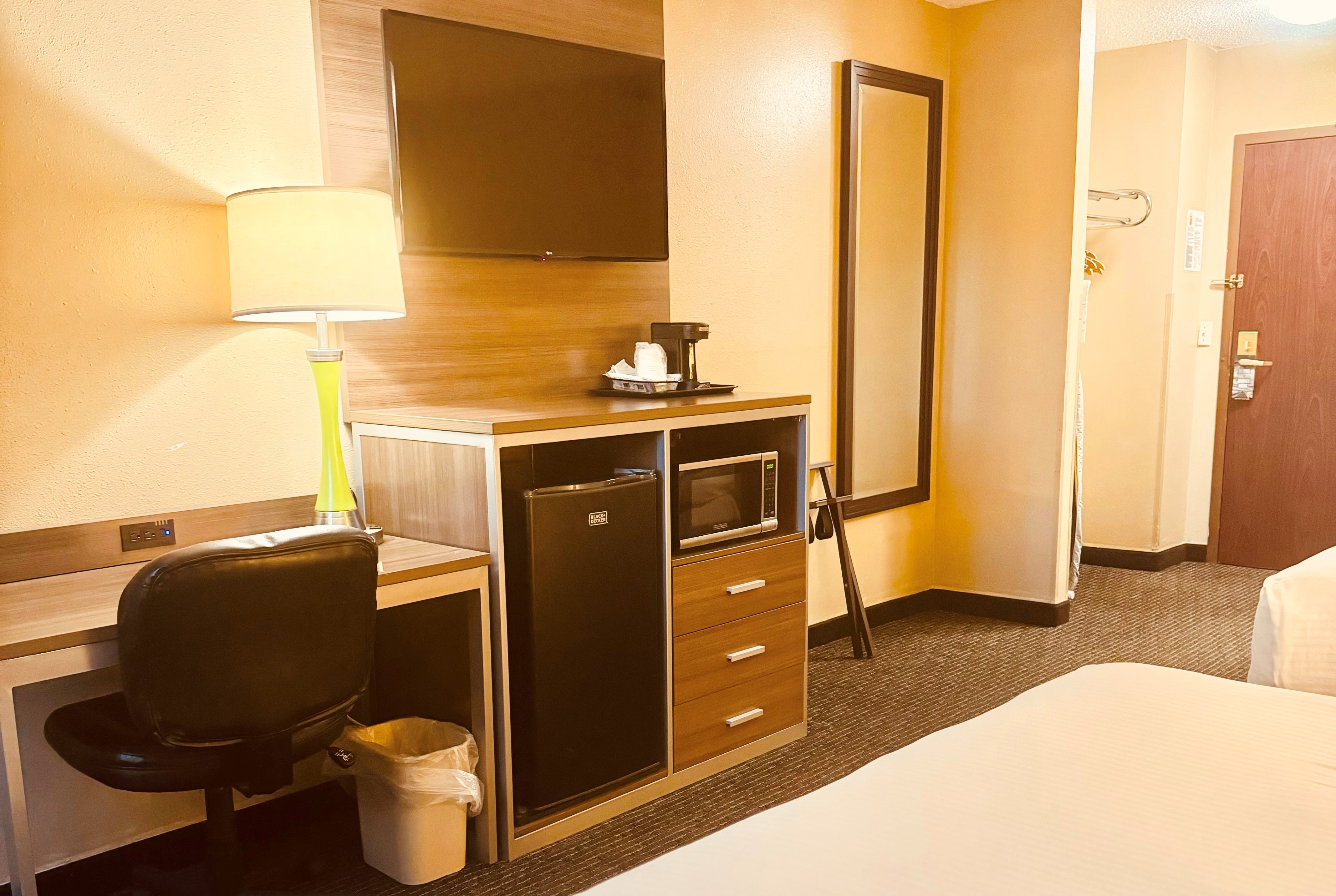 Guest room at the Super 8 by Wyndham St Charles in Saint Charles, Missouri