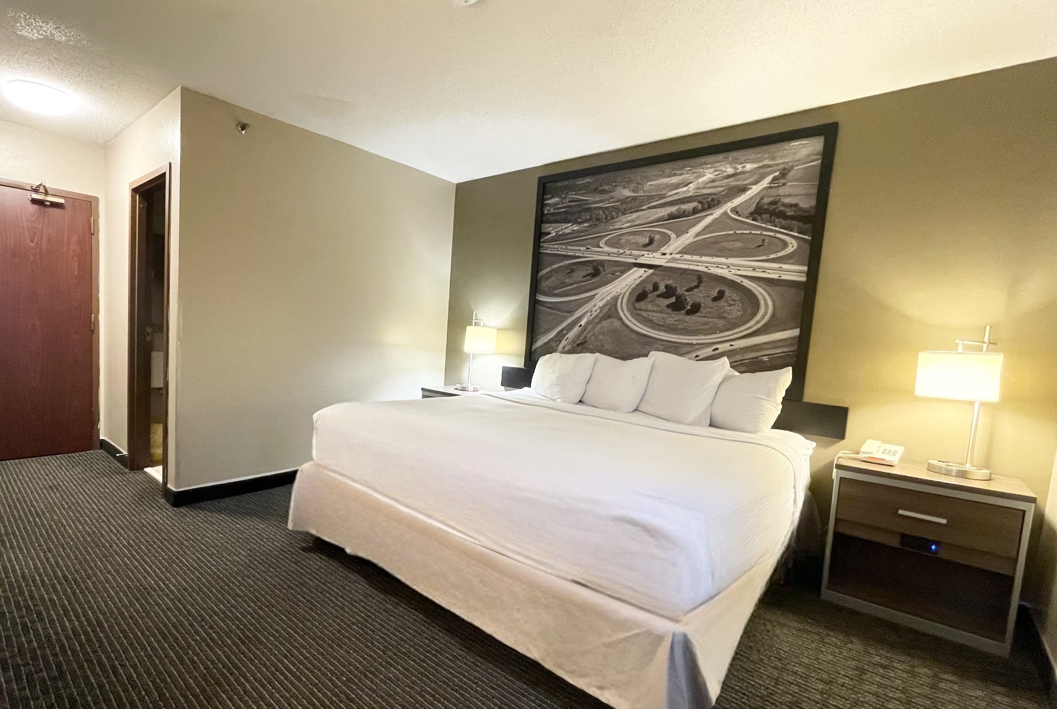 Guest room at the Super 8 by Wyndham St Charles in Saint Charles, Missouri