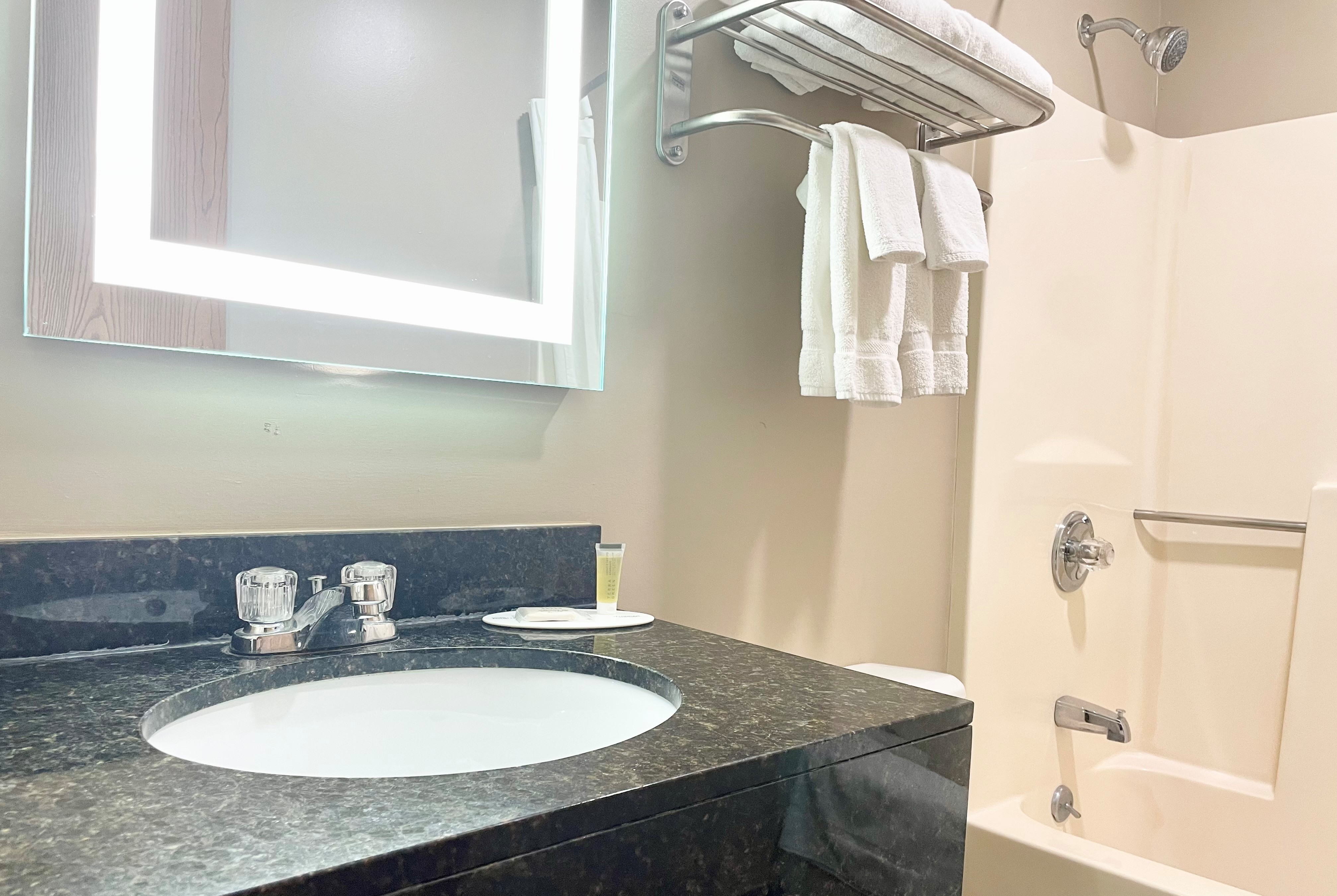 Guest room bath at the Super 8 by Wyndham St. Clair MO in Saint Clair, Missouri