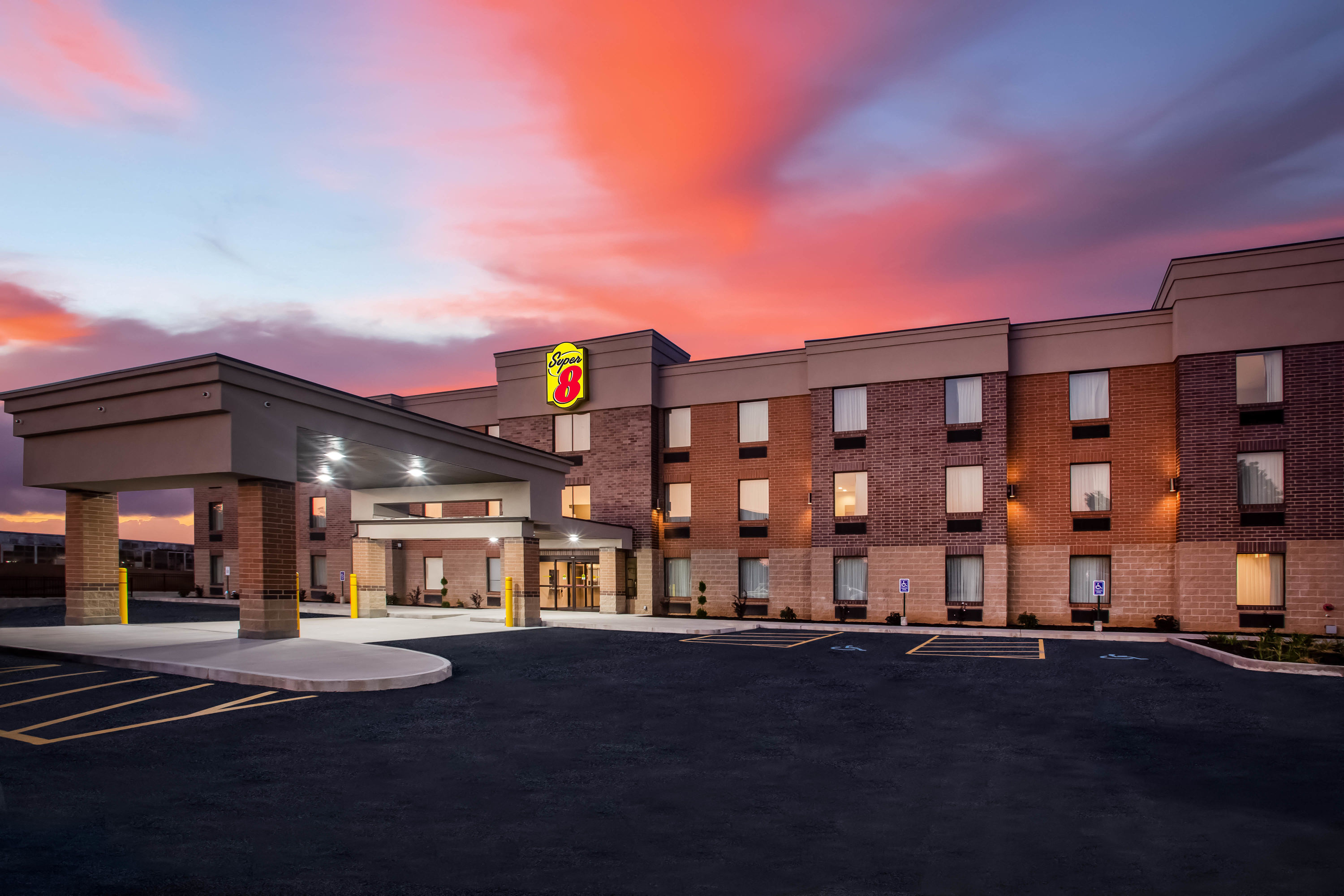 Exterior Dusk Image of Super 8 by Wyndham St. Louis North hotel in Saint Louis, Missouri