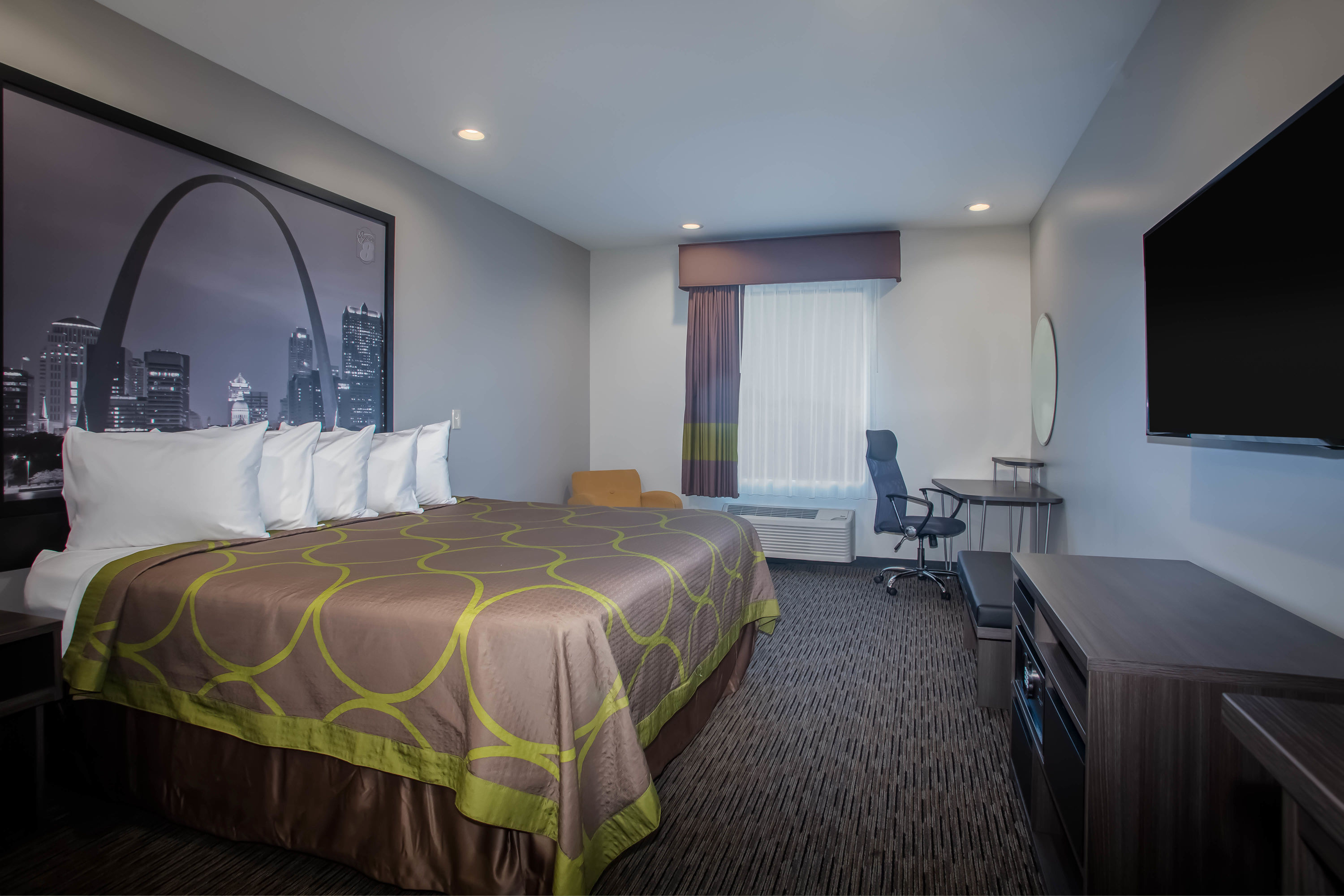 Guest room at the Super 8 by Wyndham St. Louis North in Saint Louis, Missouri