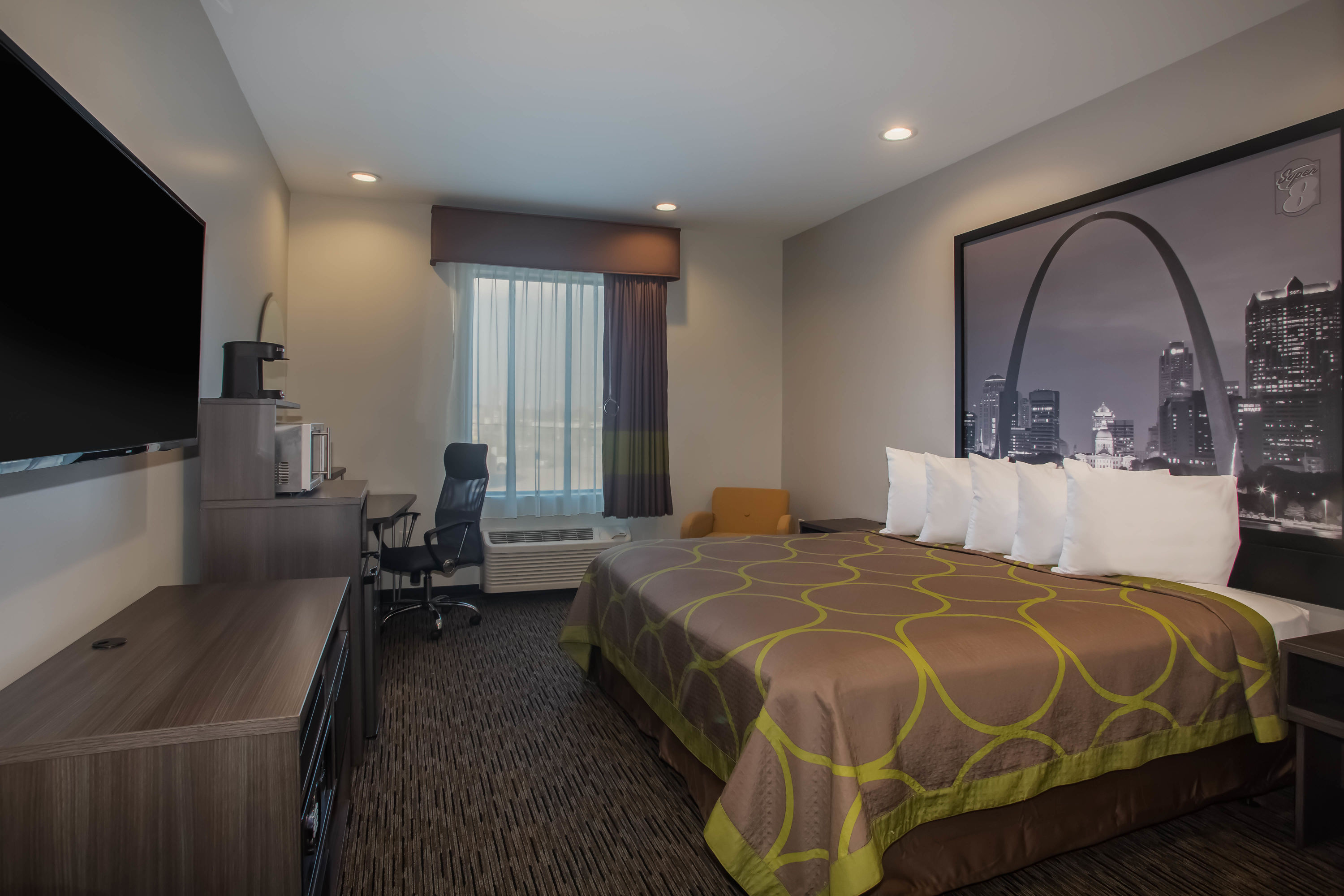 Guest room at the Super 8 by Wyndham St. Louis North in Saint Louis, Missouri