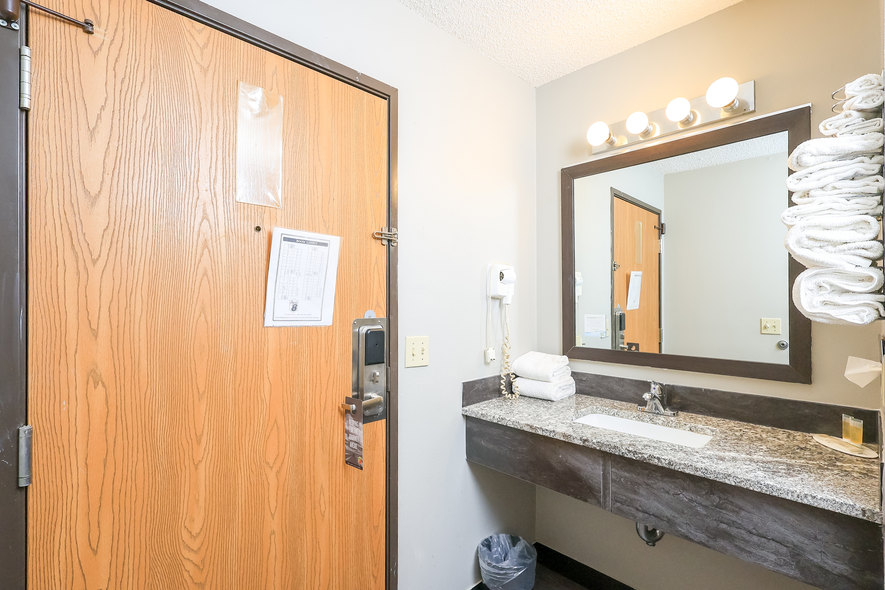 Guest room bath at the Super 8 by Wyndham Smithville/Kansas City in Smithville, Missouri