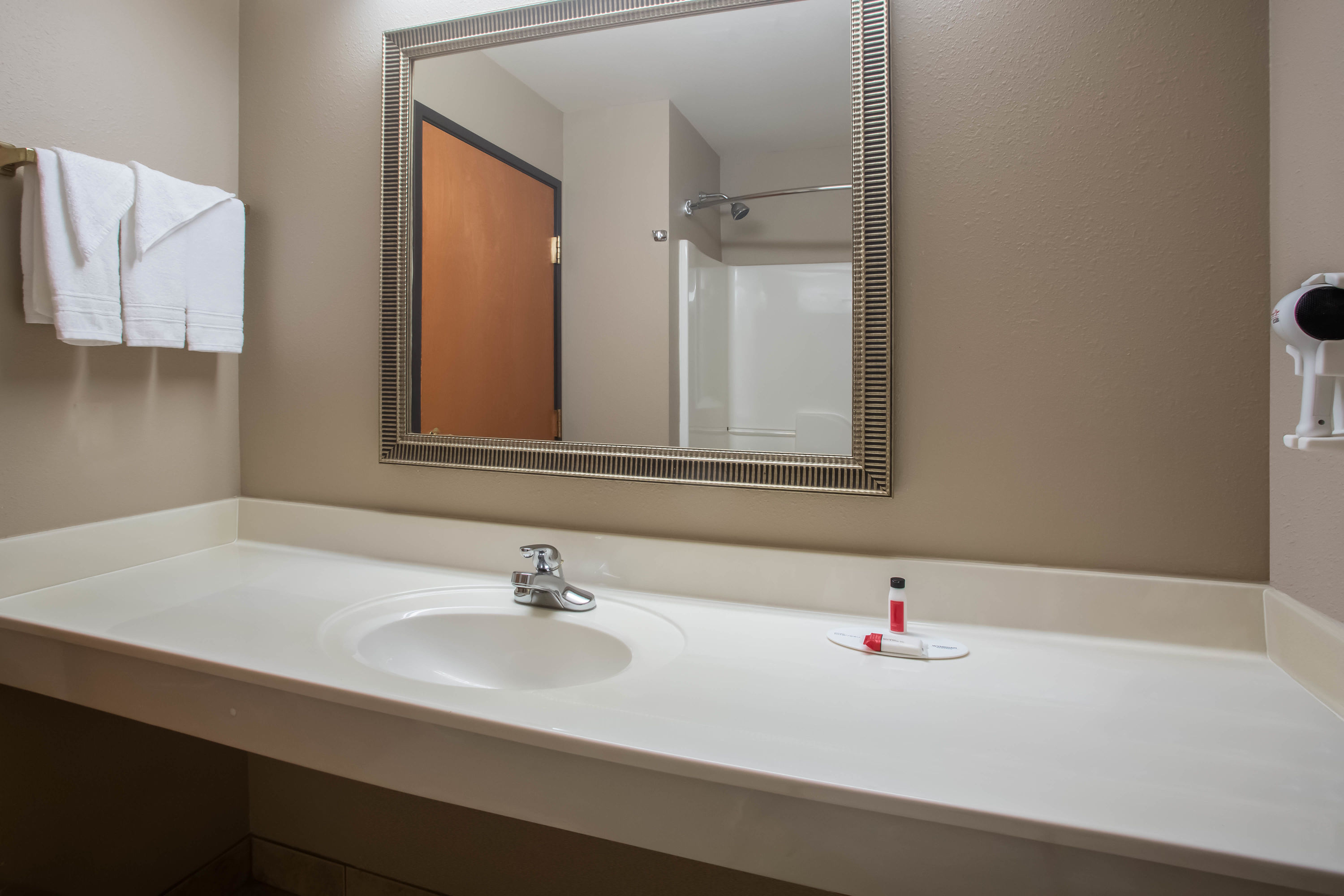 Guest room bath at the Super 8 by Wyndham Union in Union, Missouri
