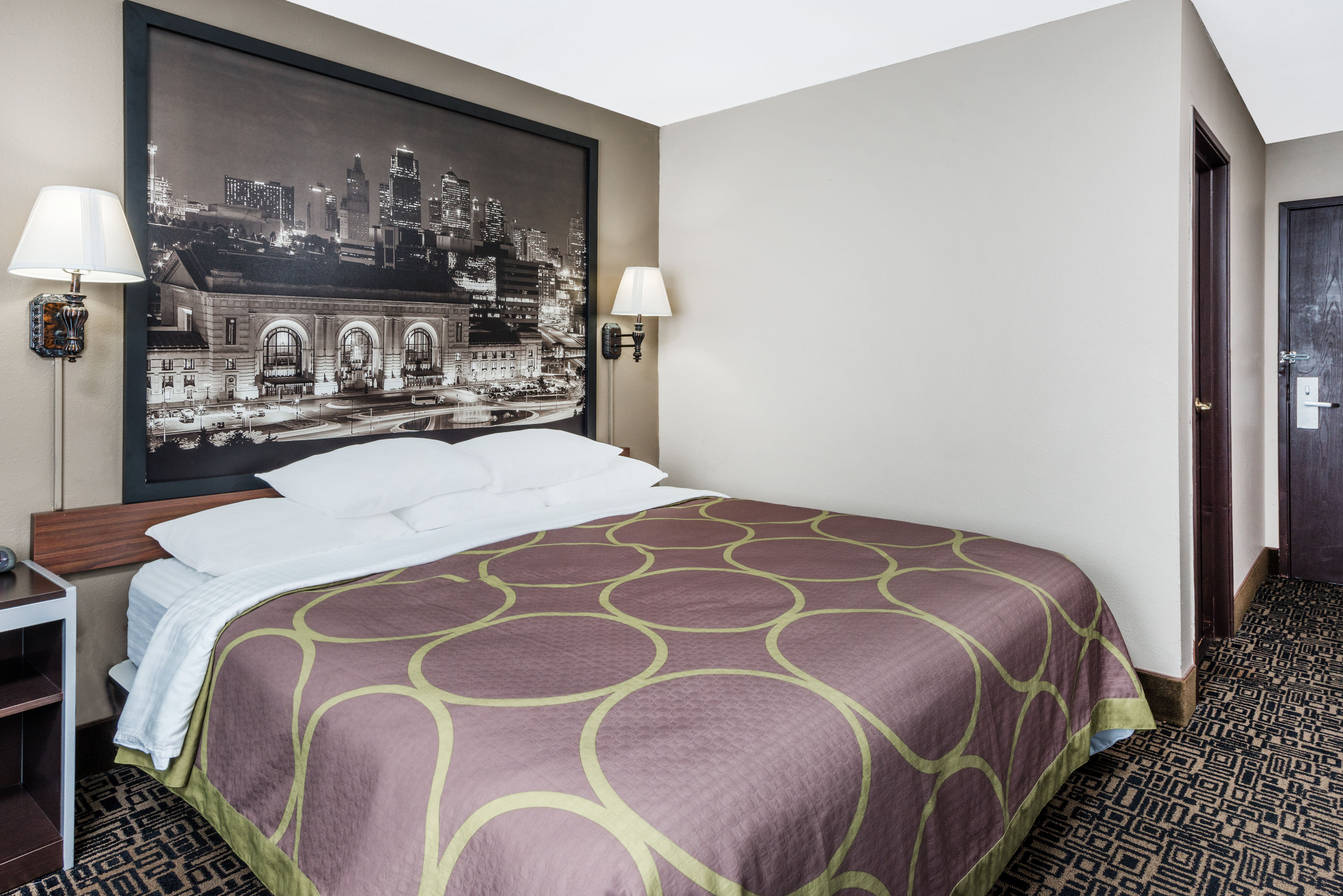 Guest room at the Super 8 by Wyndham Warrensburg in Warrensburg, Missouri