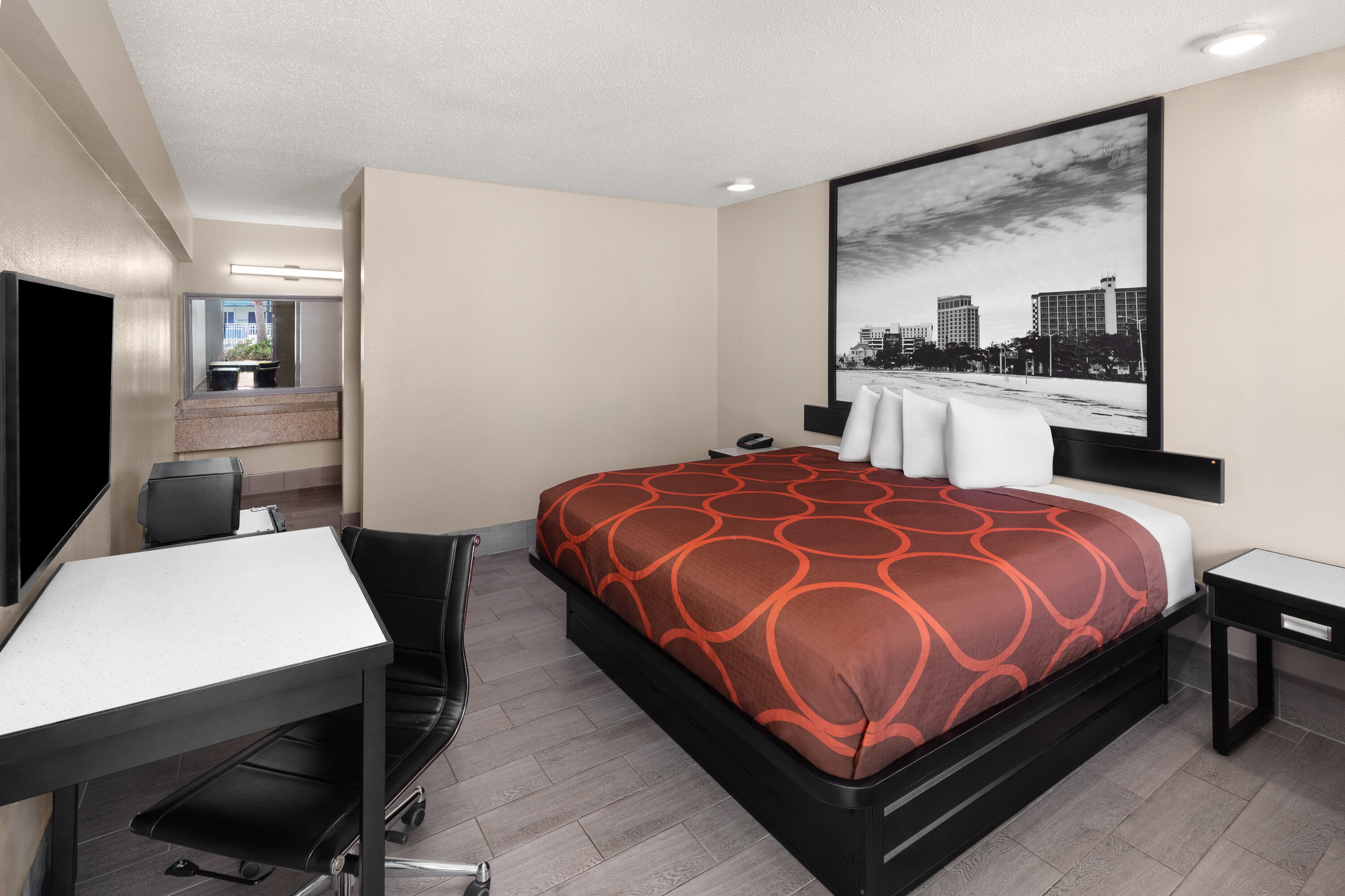Guest room at the Super 8 by Wyndham Biloxi at the Beach in Biloxi, Mississippi