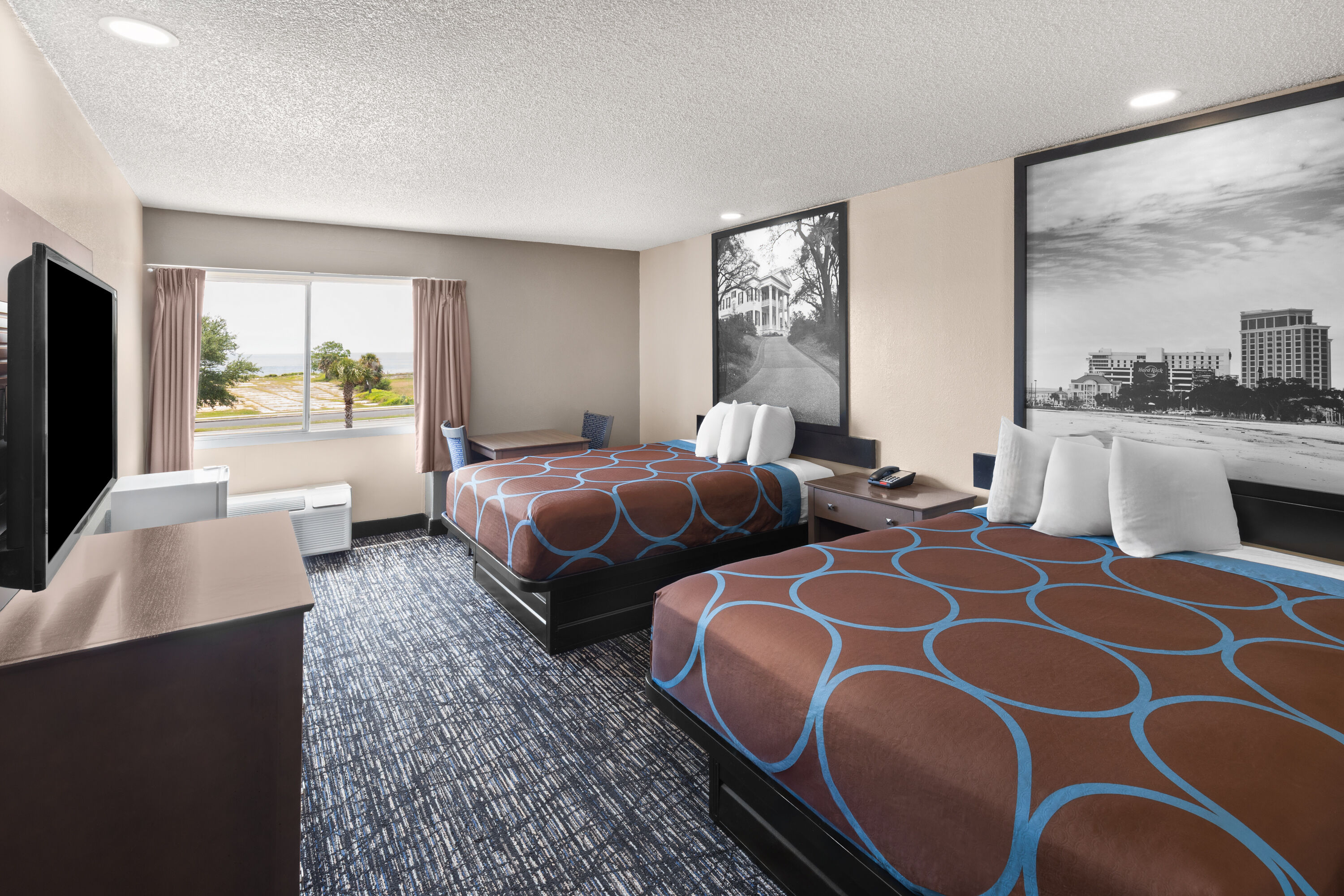 Guest room at the Super 8 by Wyndham Biloxi at the Beach in Biloxi, Mississippi