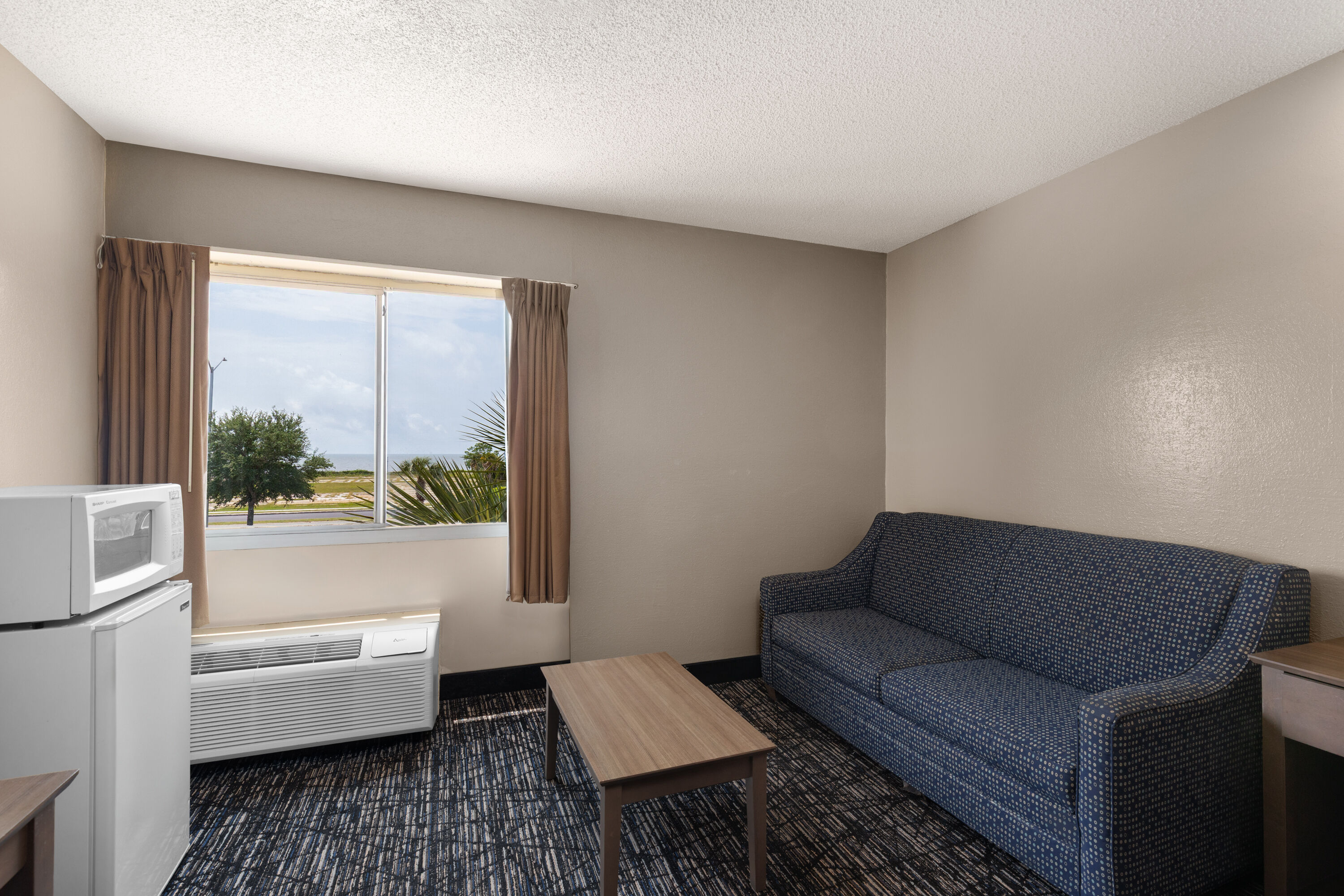 Guest room at the Super 8 by Wyndham Biloxi at the Beach in Biloxi, Mississippi