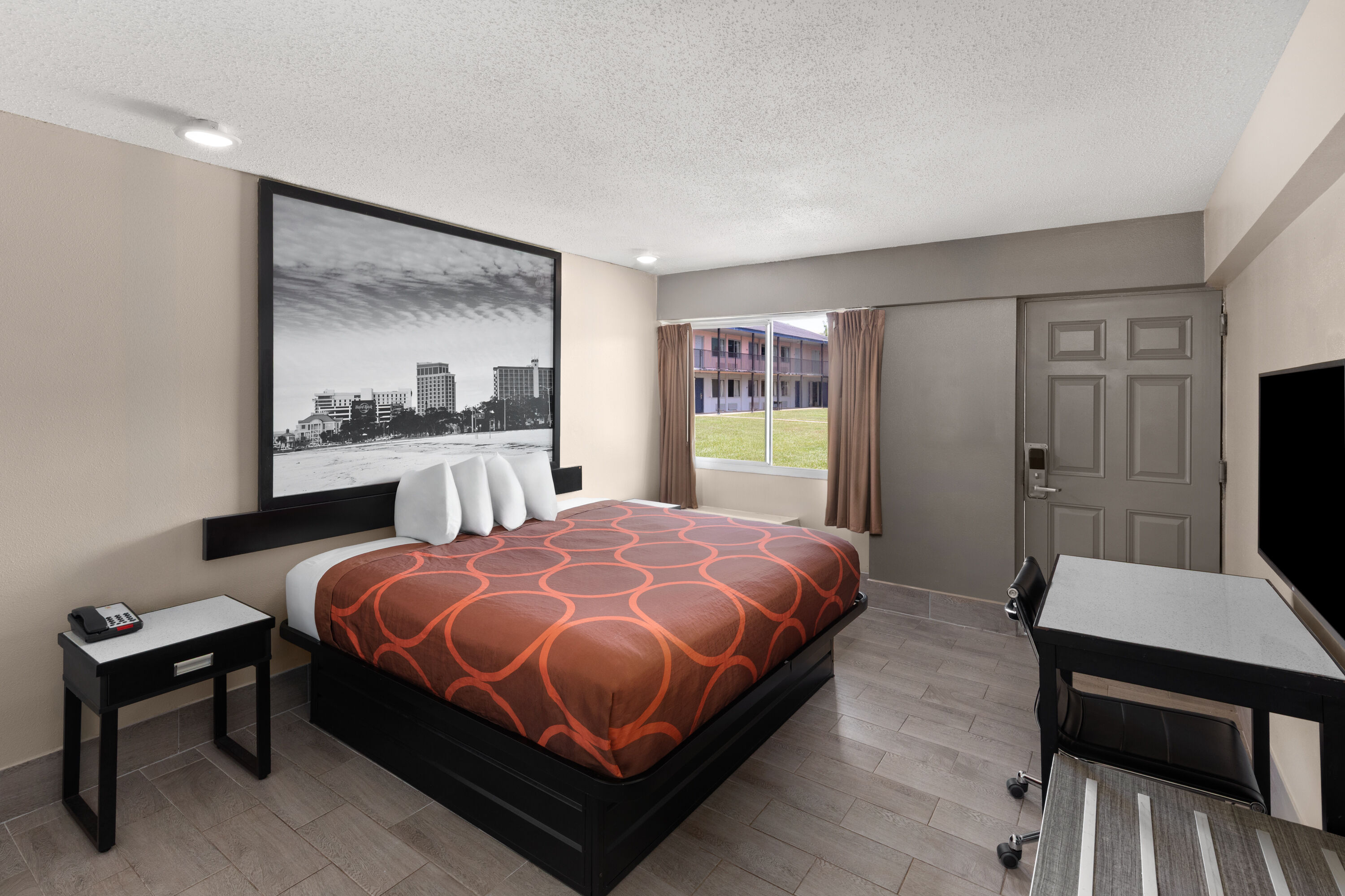 Guest room at the Super 8 by Wyndham Biloxi at the Beach in Biloxi, Mississippi