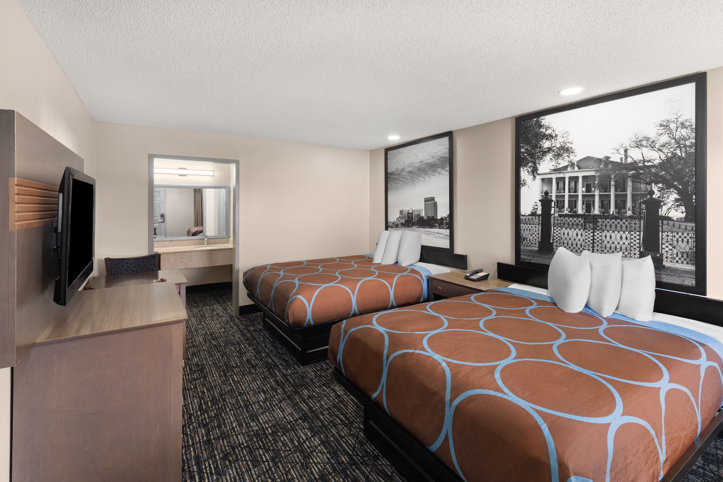 Guest room at the Super 8 by Wyndham Biloxi at the Beach in Biloxi, Mississippi