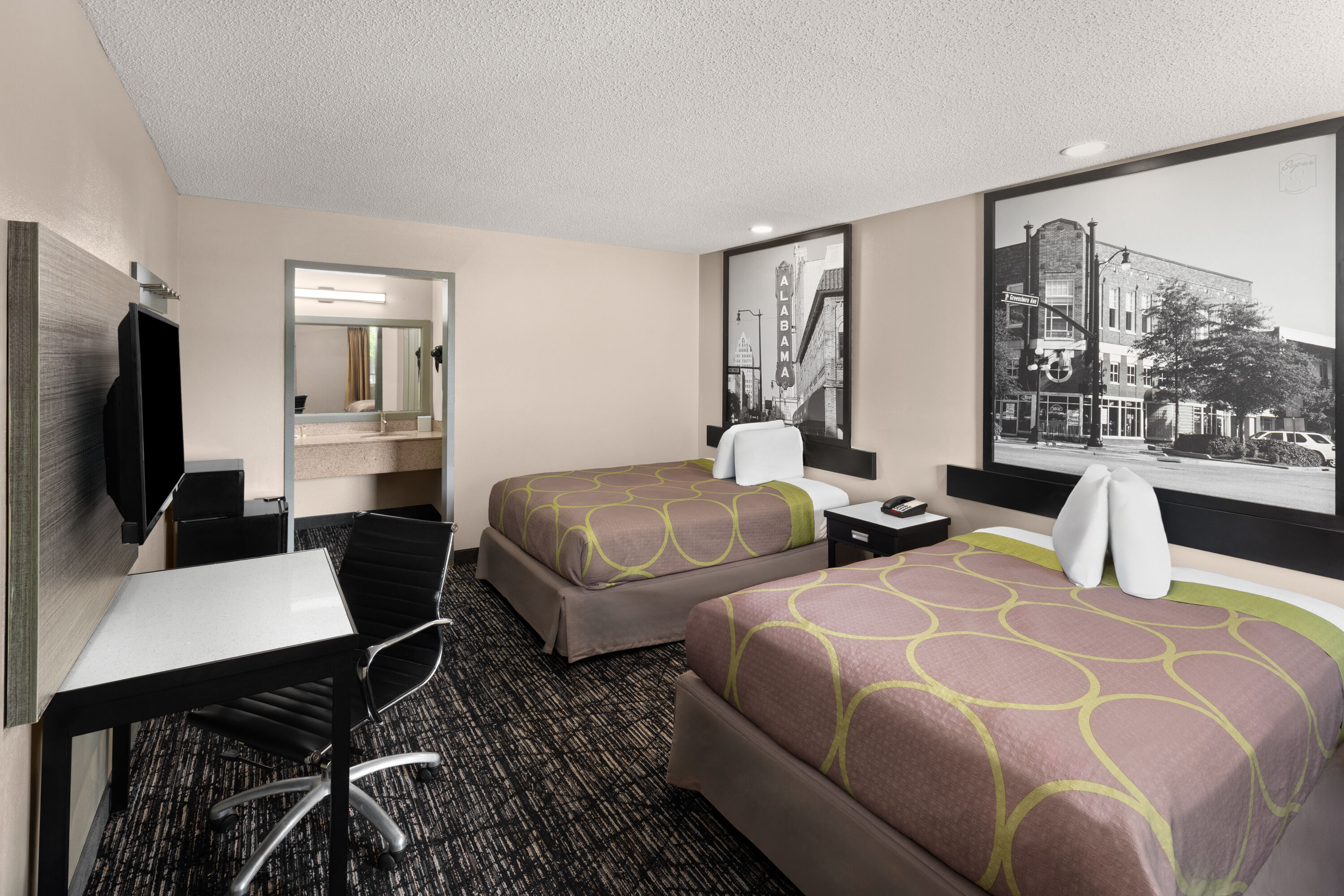 Guest room at the Super 8 by Wyndham Biloxi at the Beach in Biloxi, Mississippi
