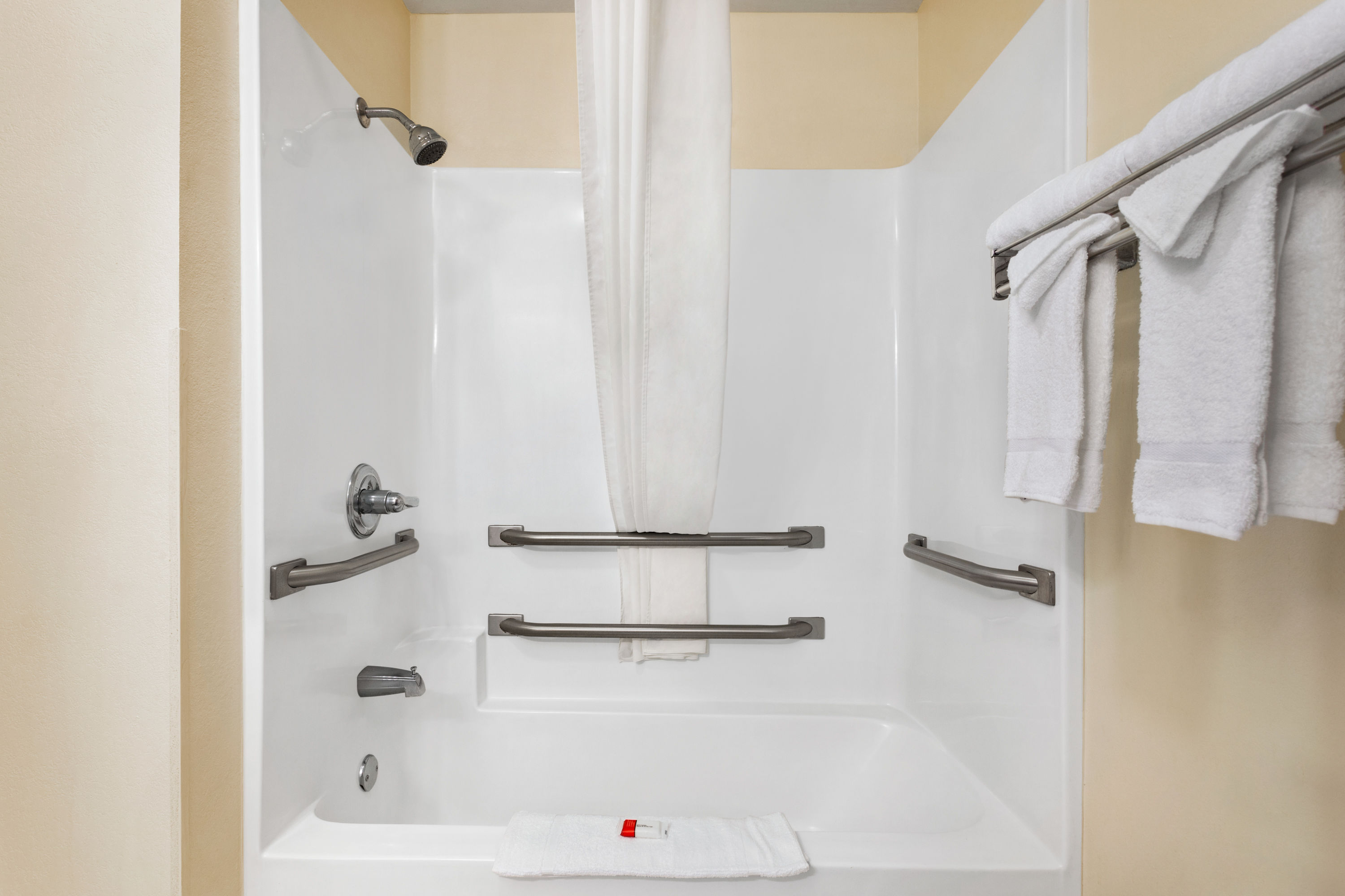 Guest room bath at the Super 8 by Wyndham Clinton in Clinton, Mississippi