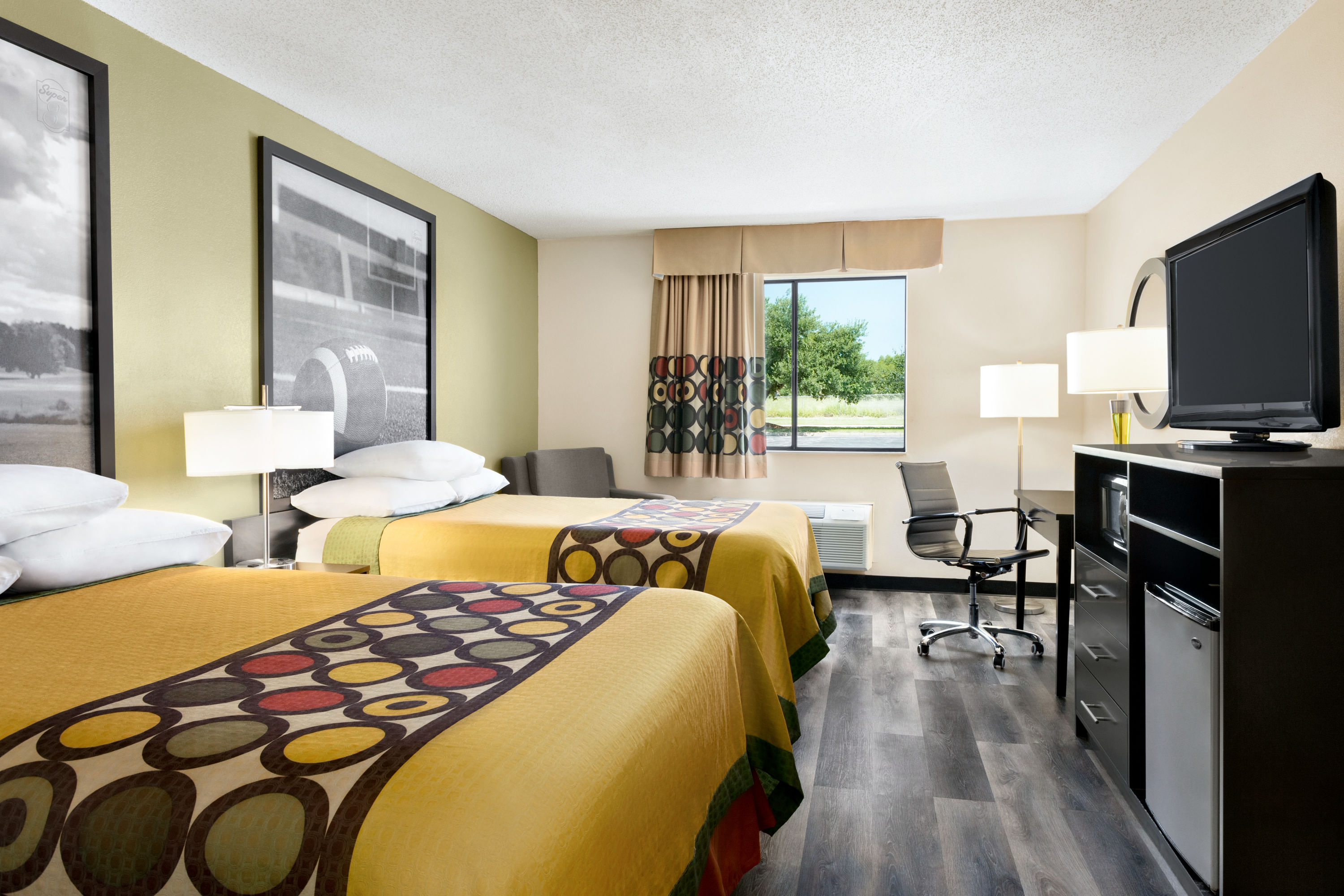 Guest room at the Super 8 by Wyndham Clinton in Clinton, Mississippi