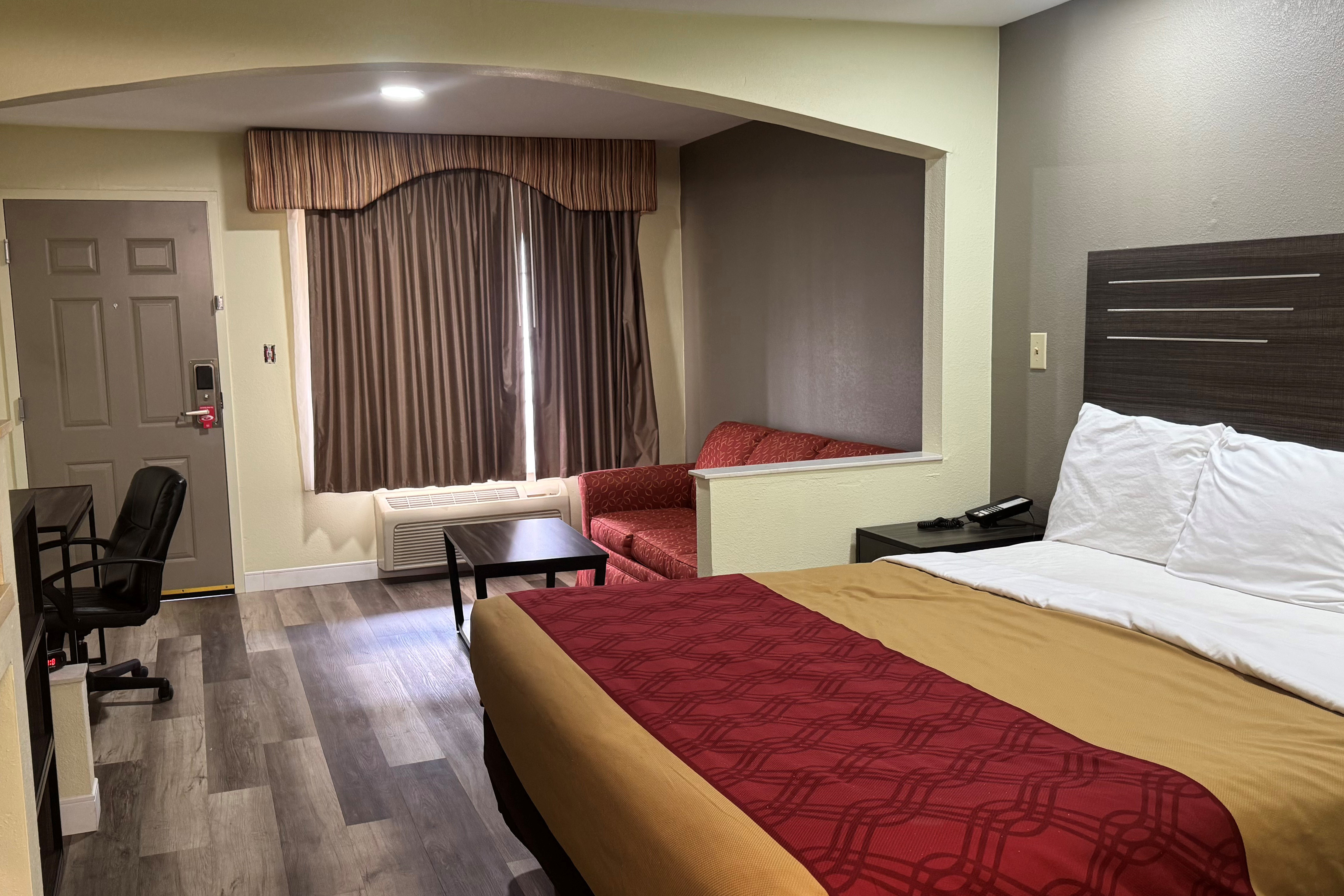 Guest room at the Super 8 by Wyndham Jackson MS Near the Fairgrounds in Jackson, Mississippi