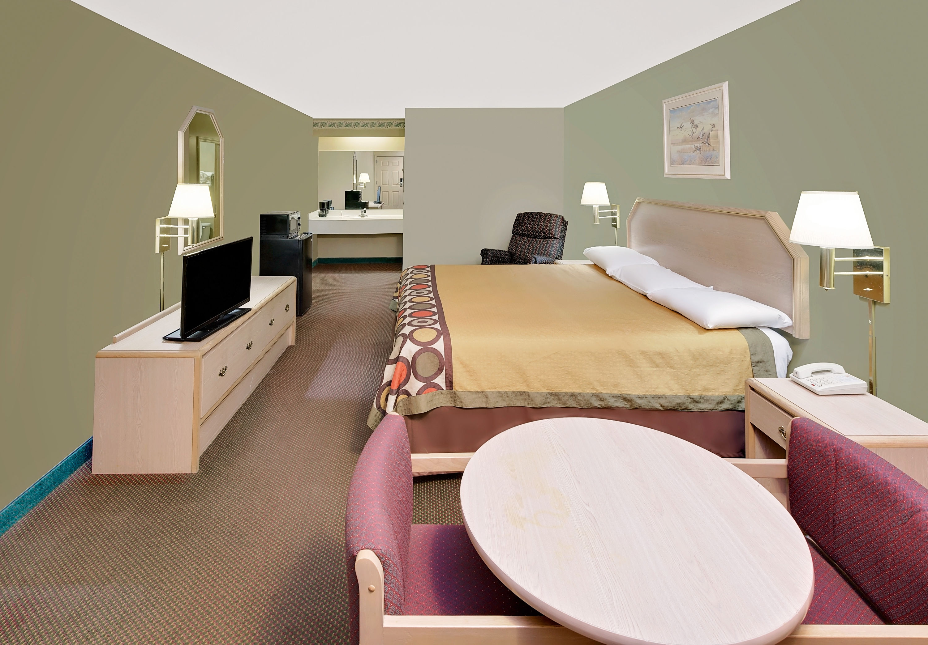 Guest room at the Super 8 by Wyndham Kosciusko in Kosciusko, Mississippi