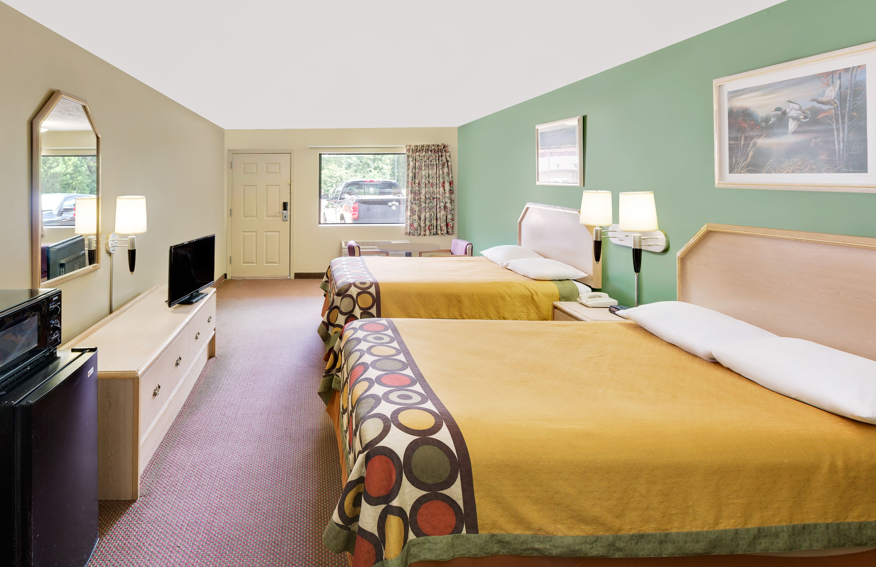 Guest room at the Super 8 by Wyndham Kosciusko in Kosciusko, Mississippi