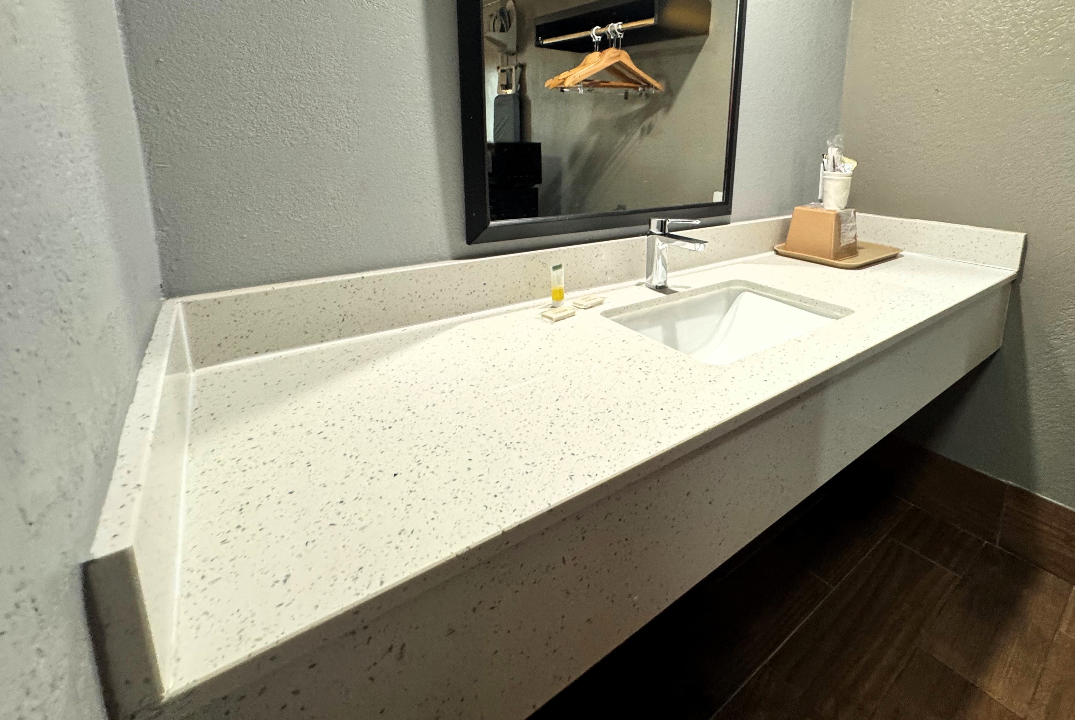 Guest room bath at the Super 8 by Wyndham Meridian in Meridian, Mississippi