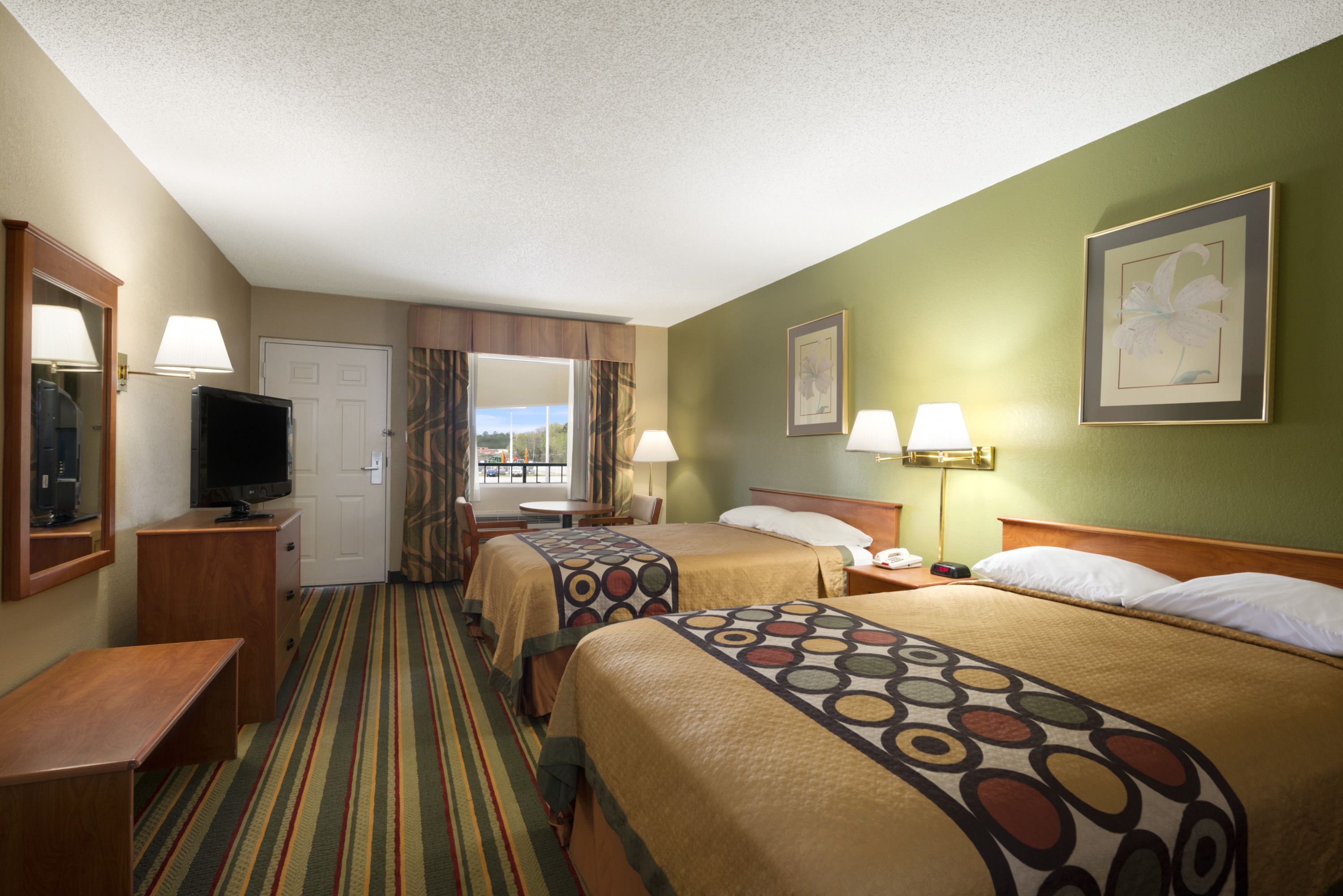 Guest room at the Super 8 by Wyndham Meridian in Meridian, Mississippi