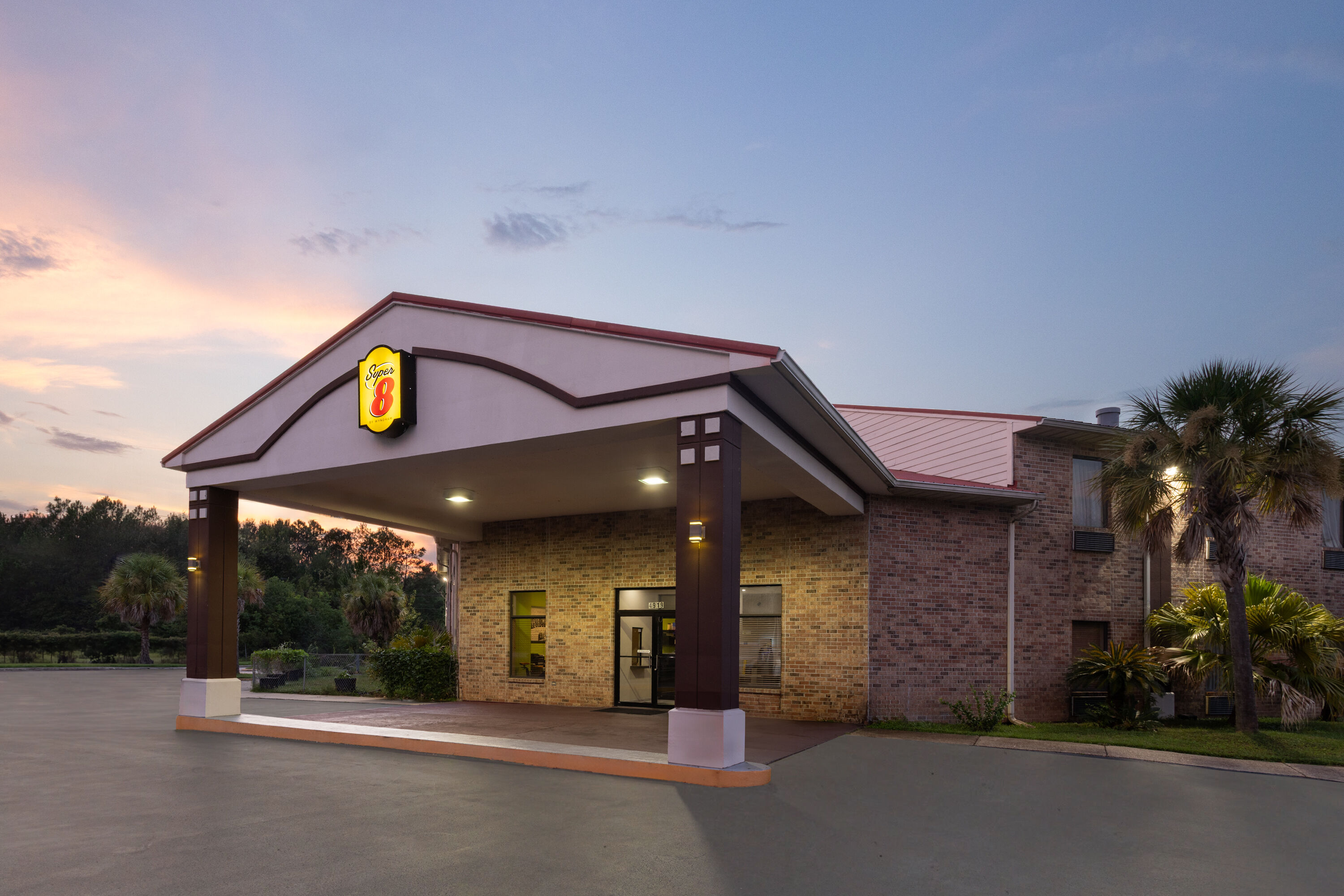 Exterior Dusk Image of Super 8 by Wyndham Pascagoula hotel in Pascagoula, Mississippi