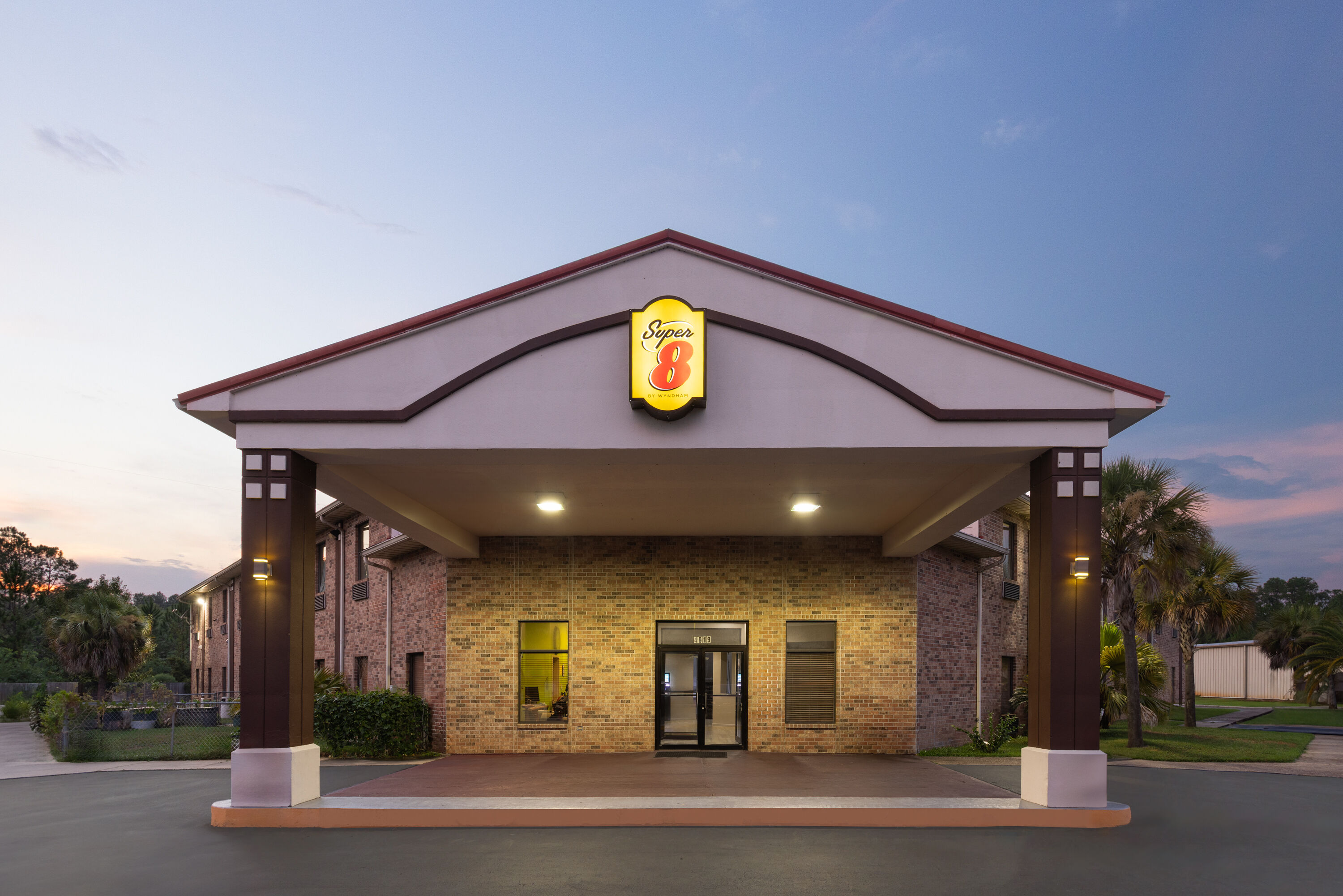 Exterior Dusk Image of Super 8 by Wyndham Pascagoula hotel in Pascagoula, Mississippi
