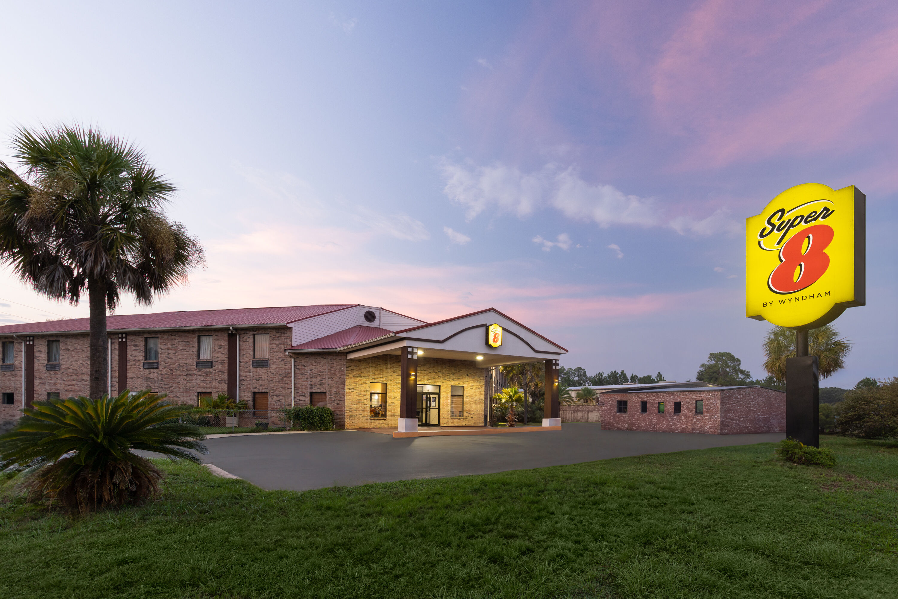 Exterior Dusk Image of Super 8 by Wyndham Pascagoula hotel in Pascagoula, Mississippi