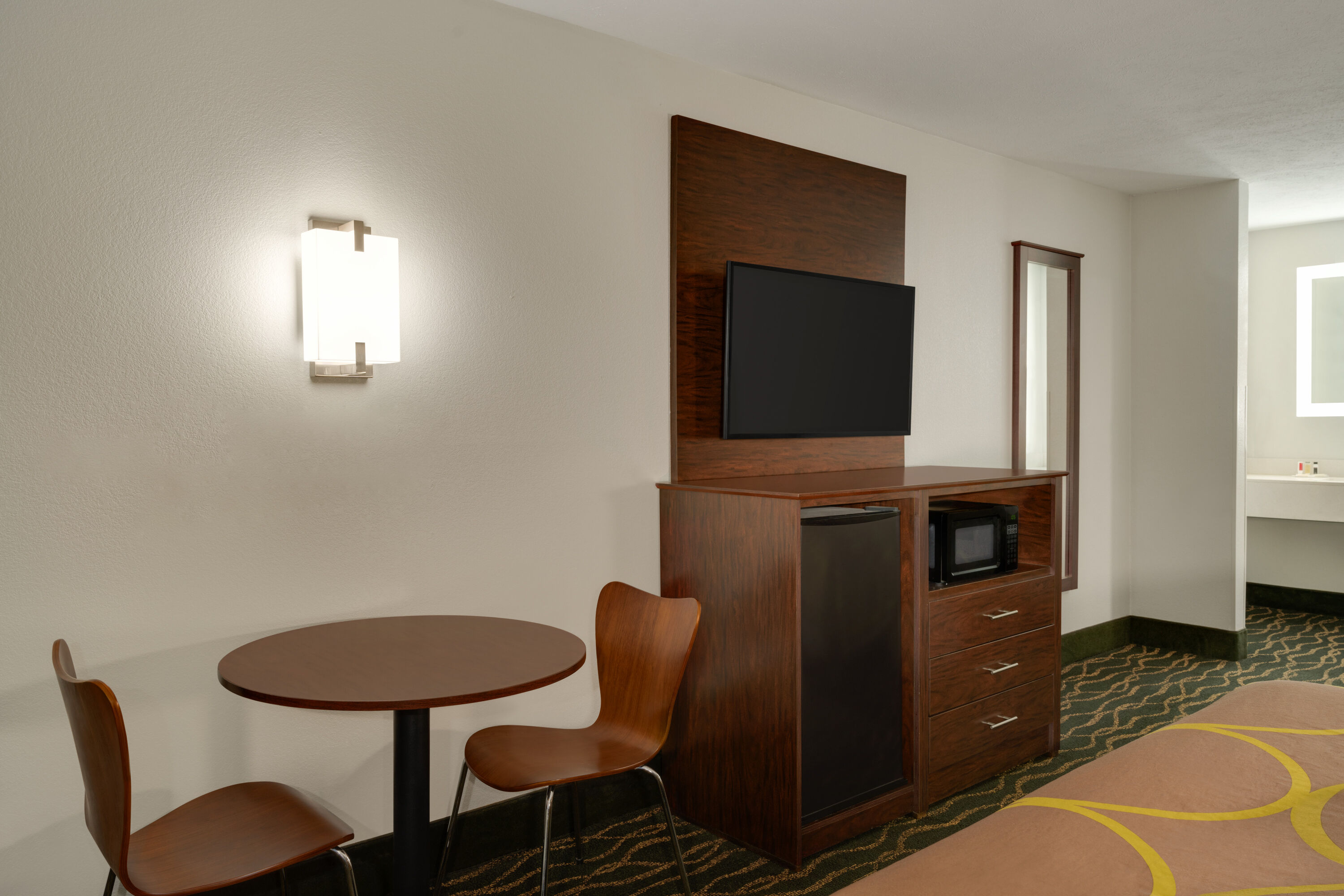 Guest room at the Super 8 by Wyndham Pearl/Jackson/East in Pearl, Mississippi