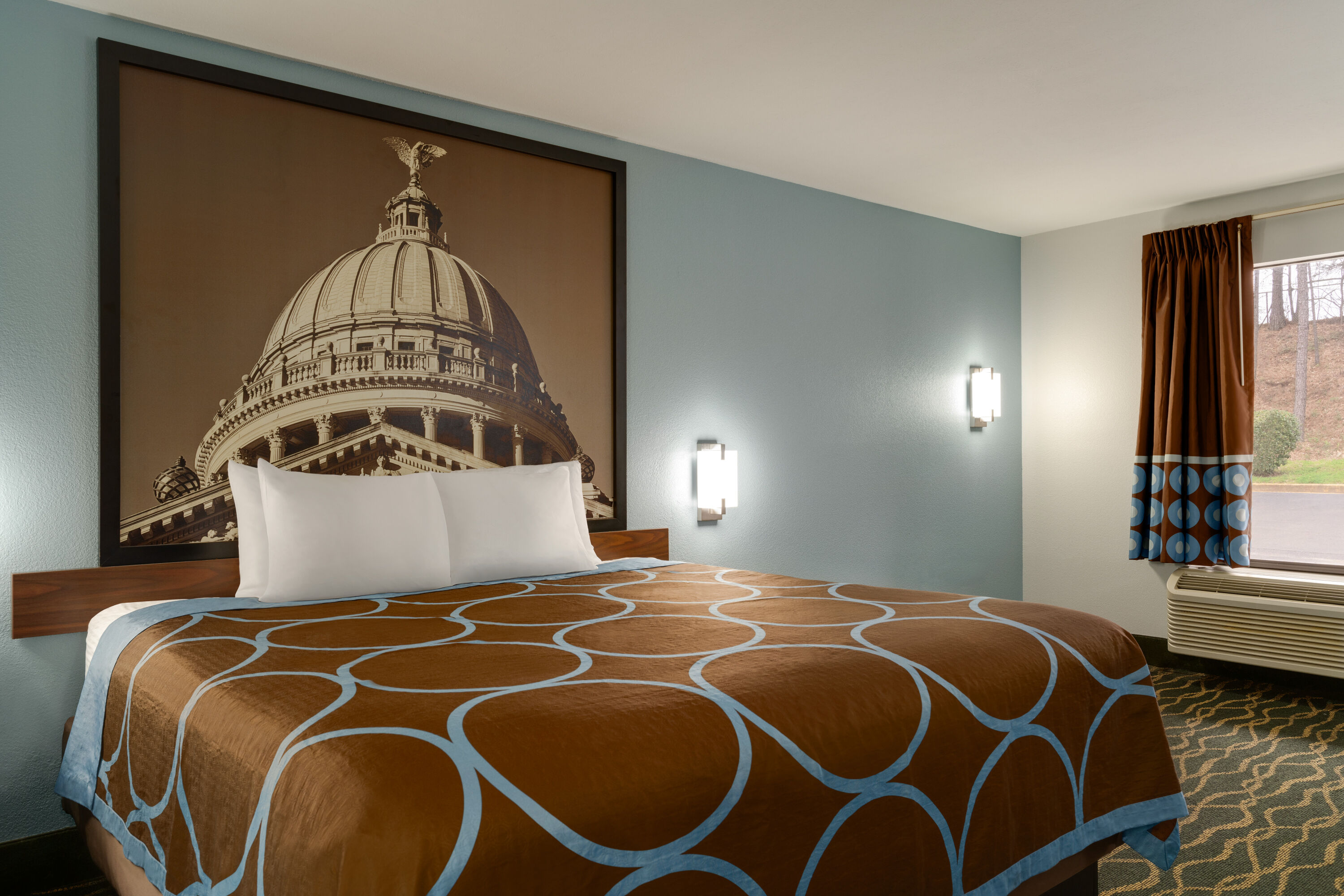 Guest room at the Super 8 by Wyndham Pearl/Jackson/East in Pearl, Mississippi