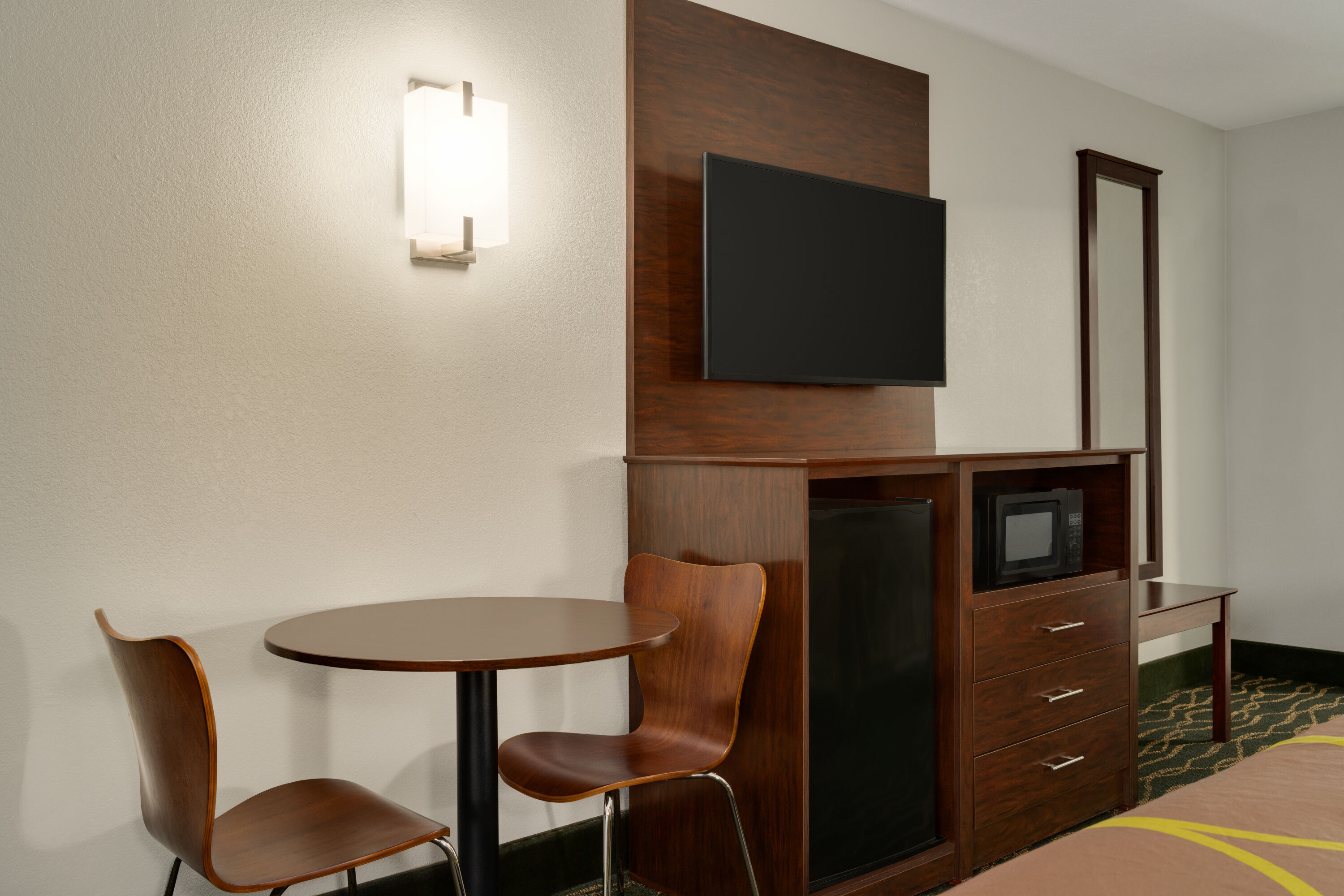 Guest room at the Super 8 by Wyndham Pearl/Jackson/East in Pearl, Mississippi