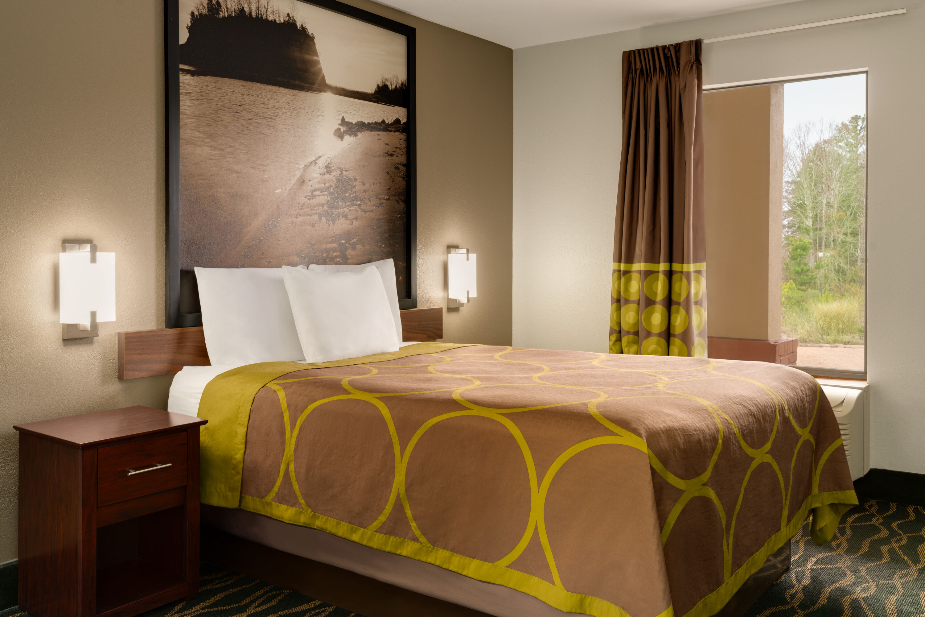 Guest room at the Super 8 by Wyndham Pearl/Jackson/East in Pearl, Mississippi