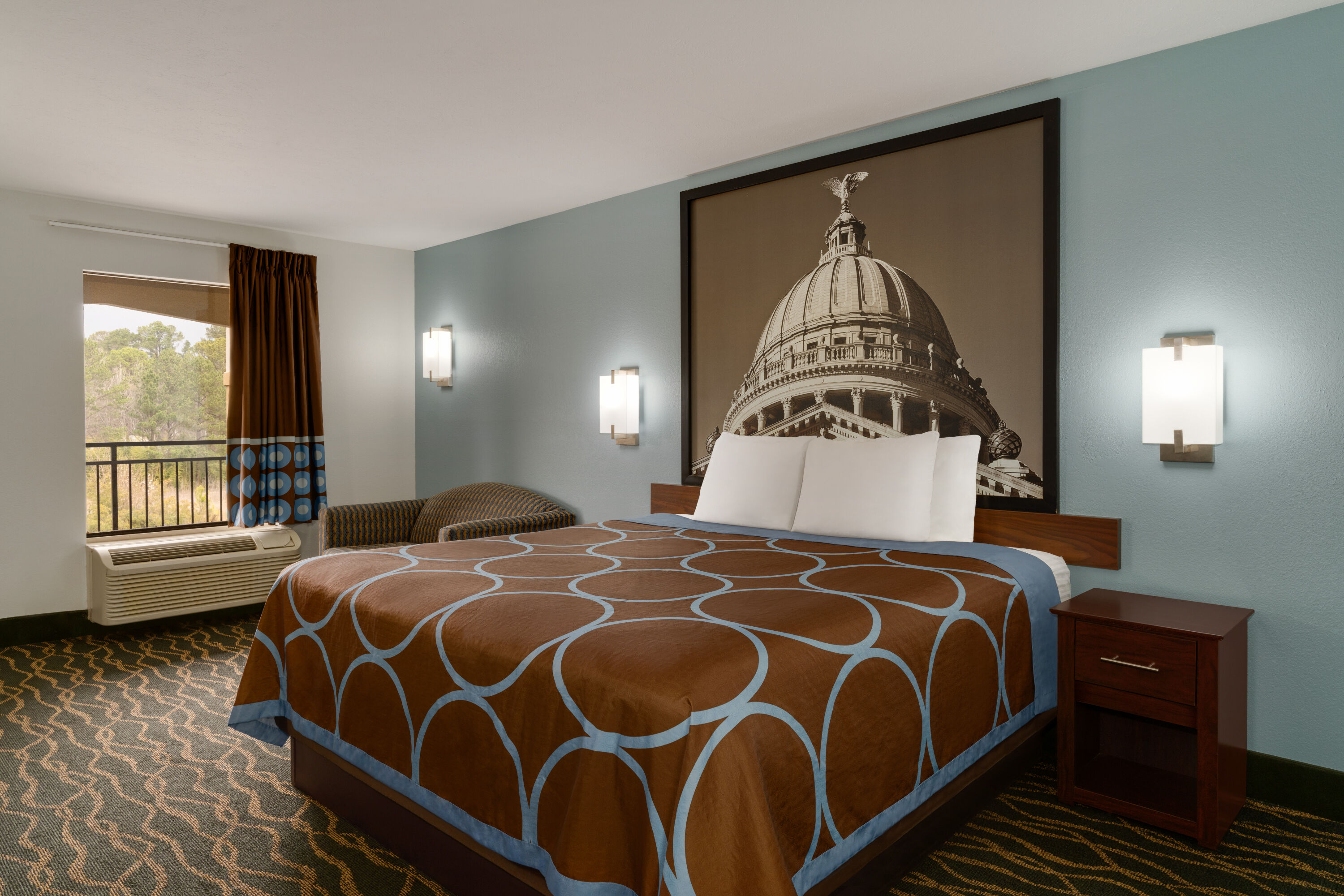 Guest room at the Super 8 by Wyndham Pearl/Jackson/East in Pearl, Mississippi