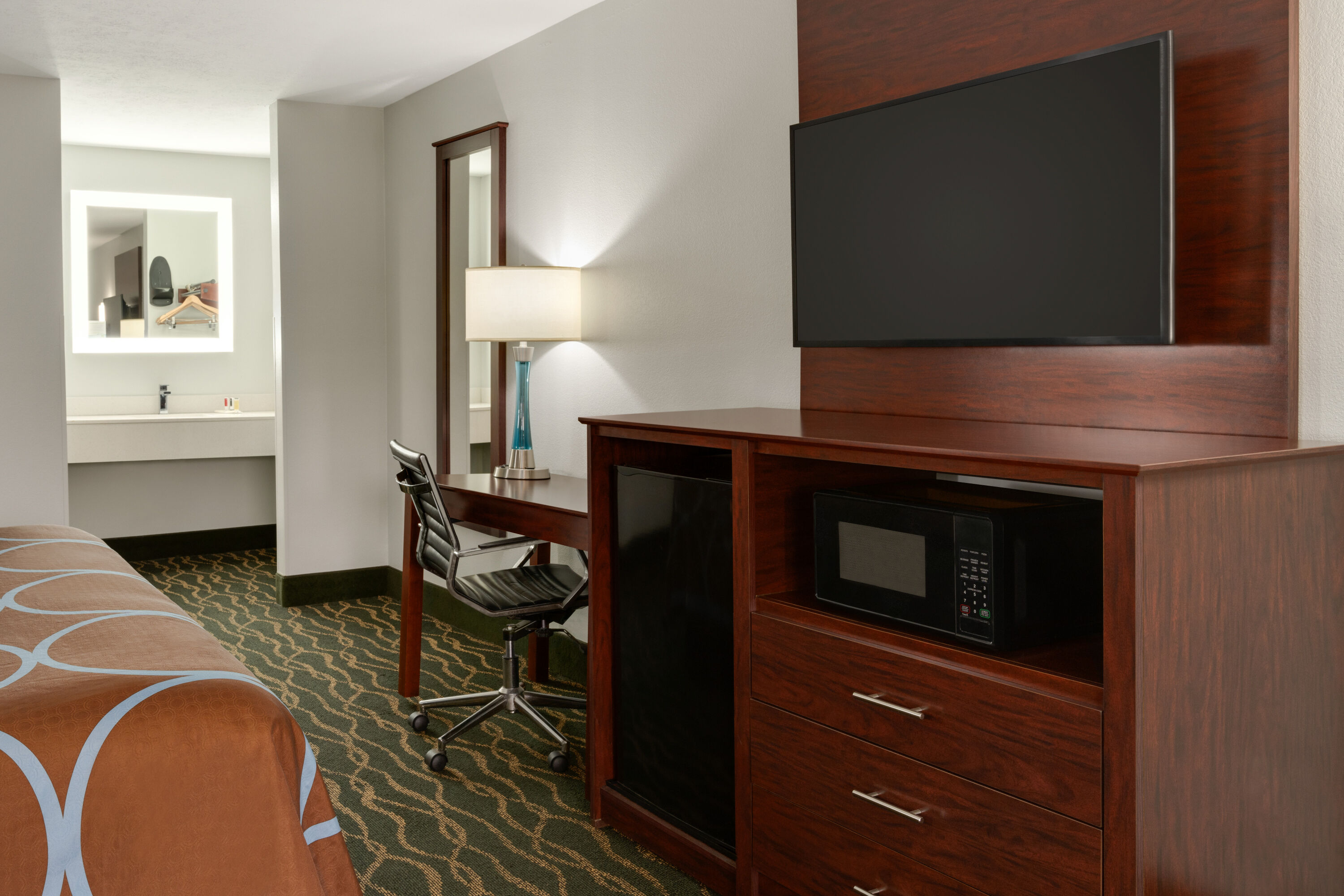 Guest room at the Super 8 by Wyndham Pearl/Jackson/East in Pearl, Mississippi