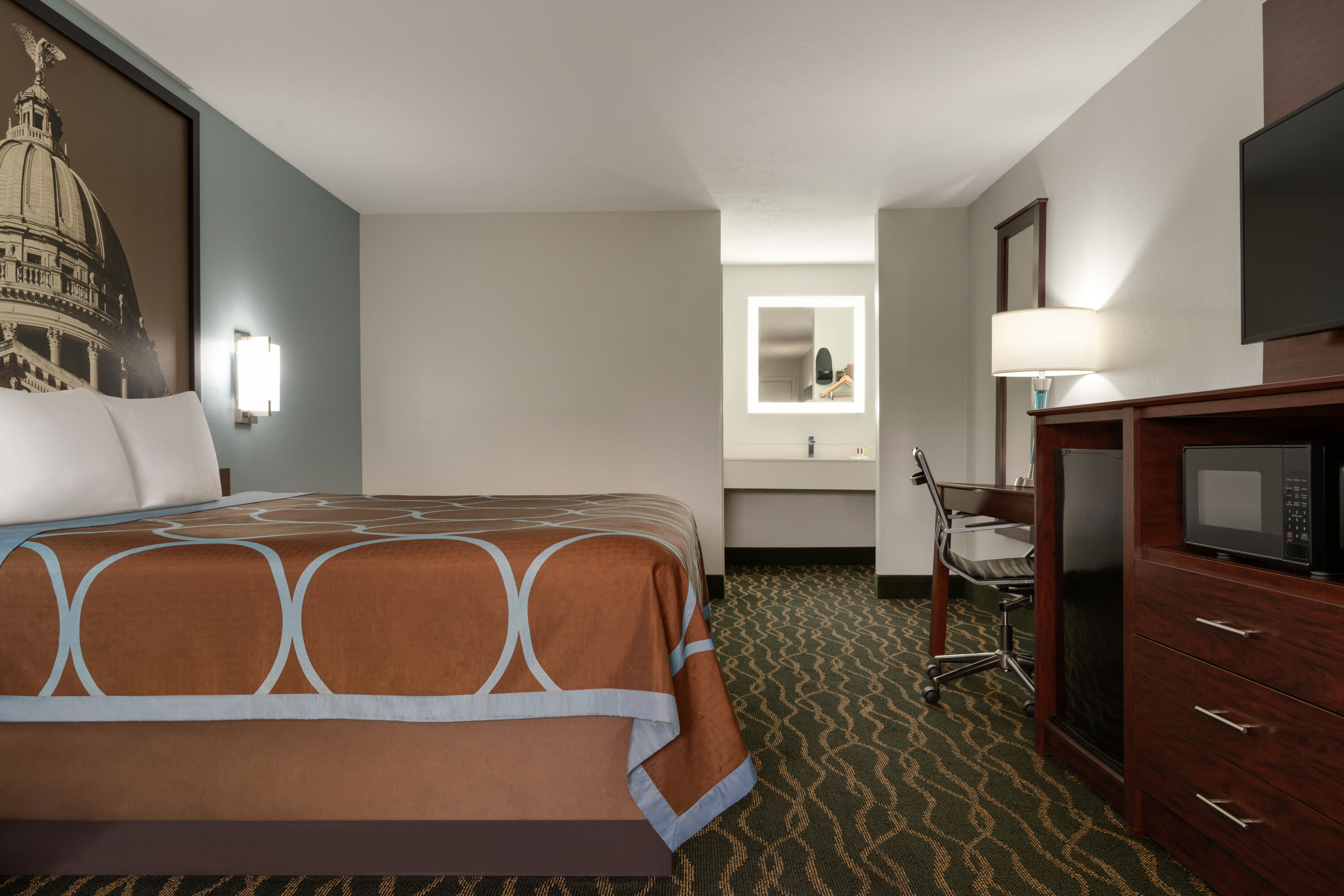 Guest room at the Super 8 by Wyndham Pearl/Jackson/East in Pearl, Mississippi