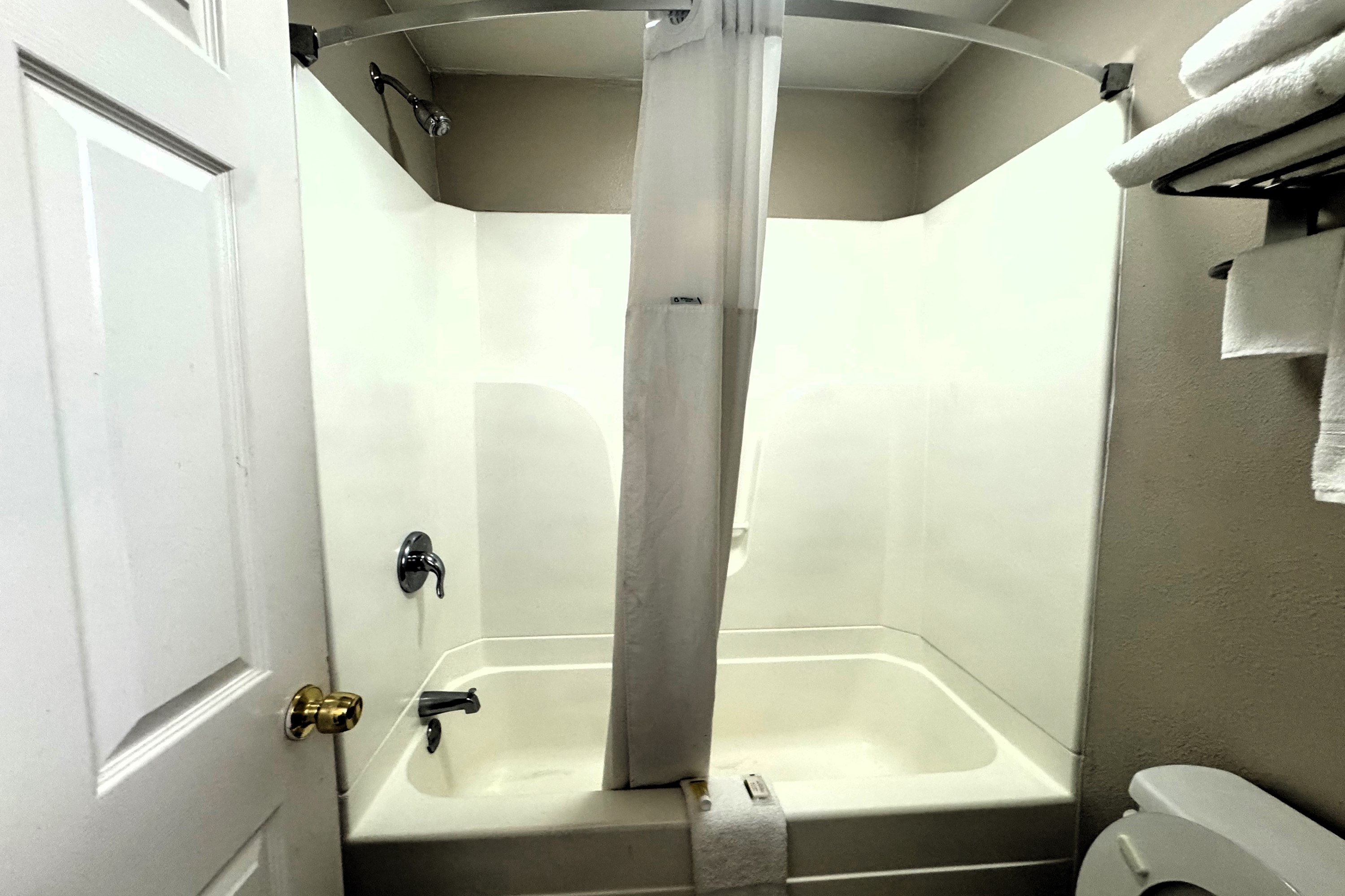 Guest room bath at the Super 8 by Wyndham Picayune in Picayune, Mississippi