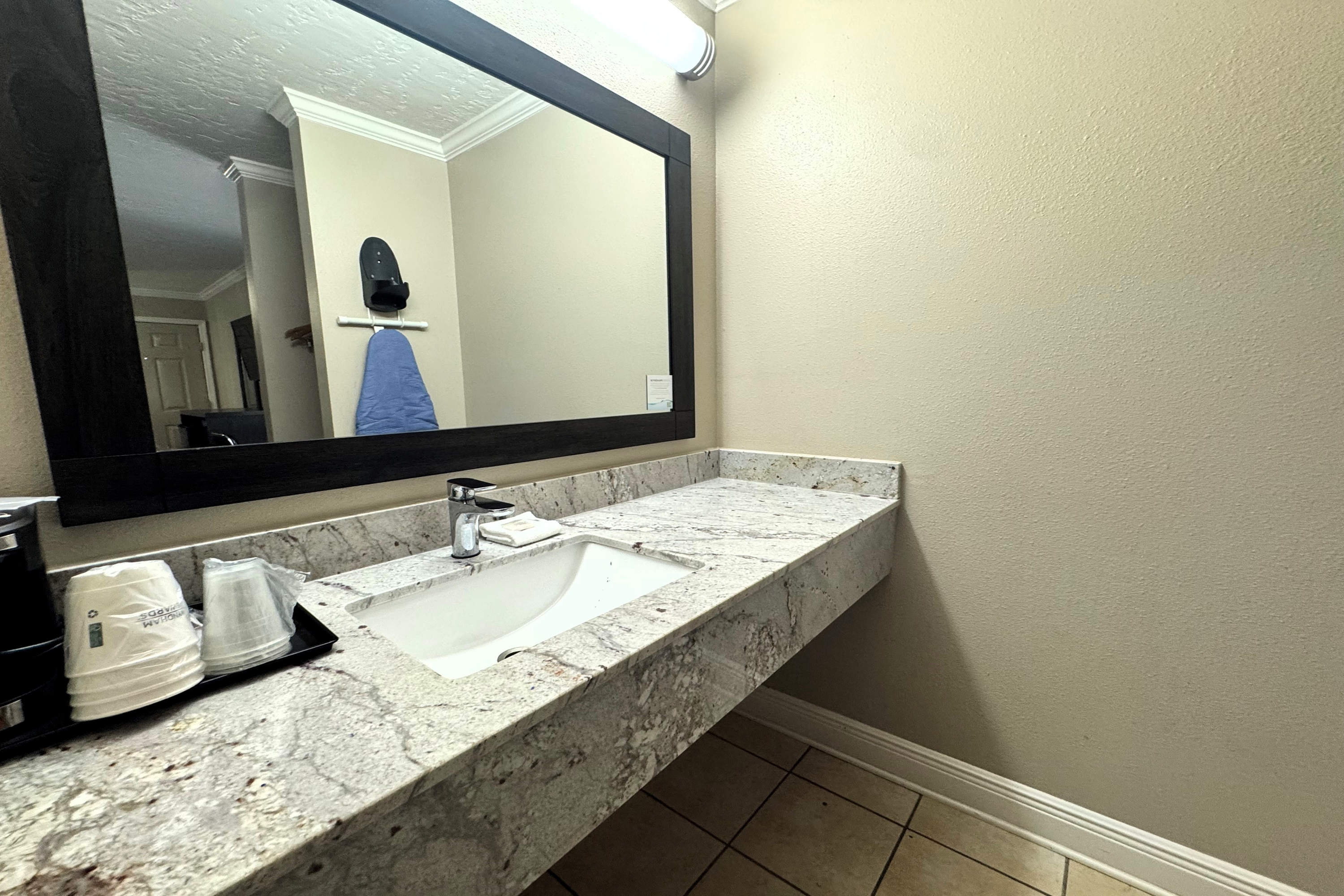 Guest room bath at the Super 8 by Wyndham Picayune in Picayune, Mississippi