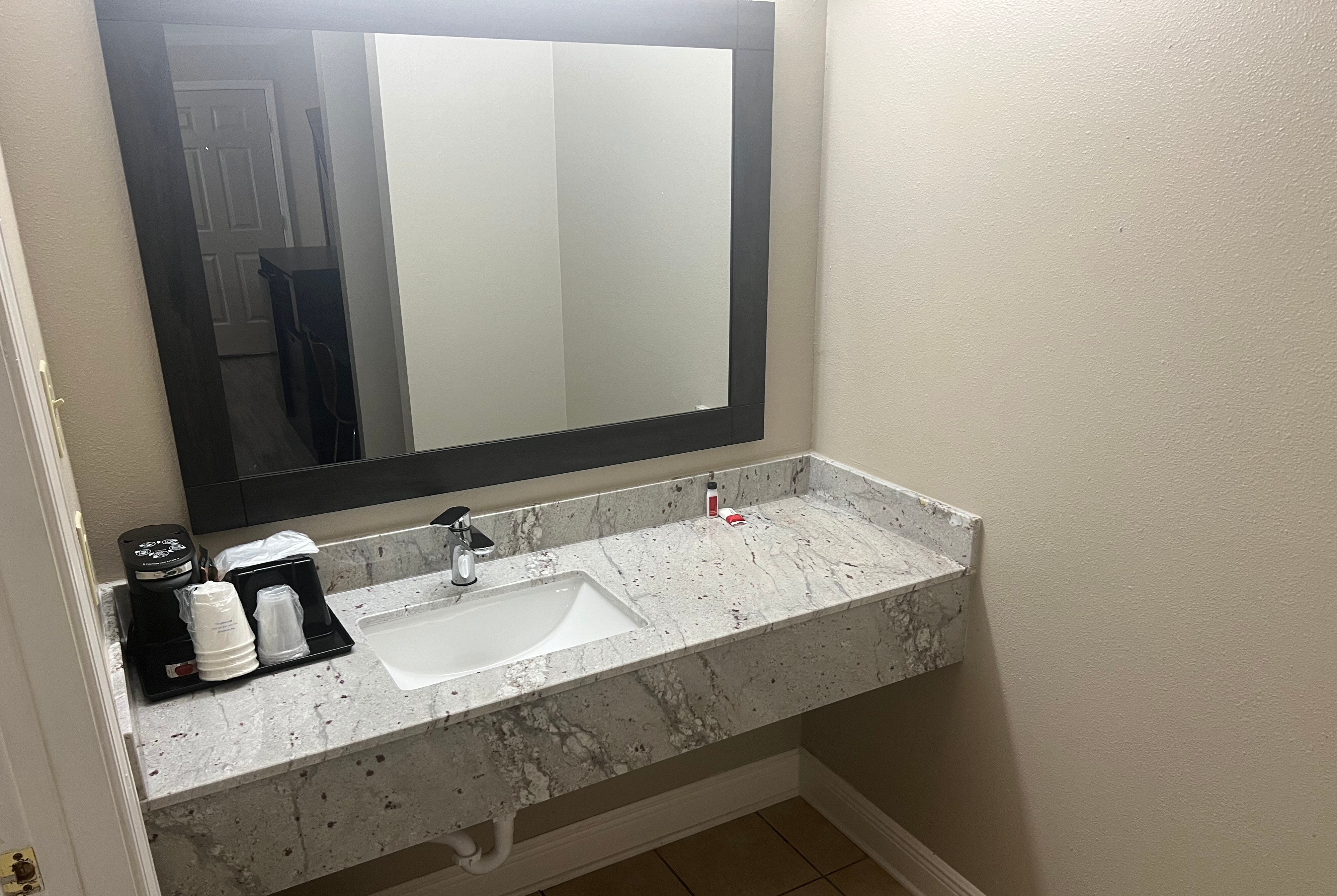 Guest room bath at the Super 8 by Wyndham Picayune in Picayune, Mississippi