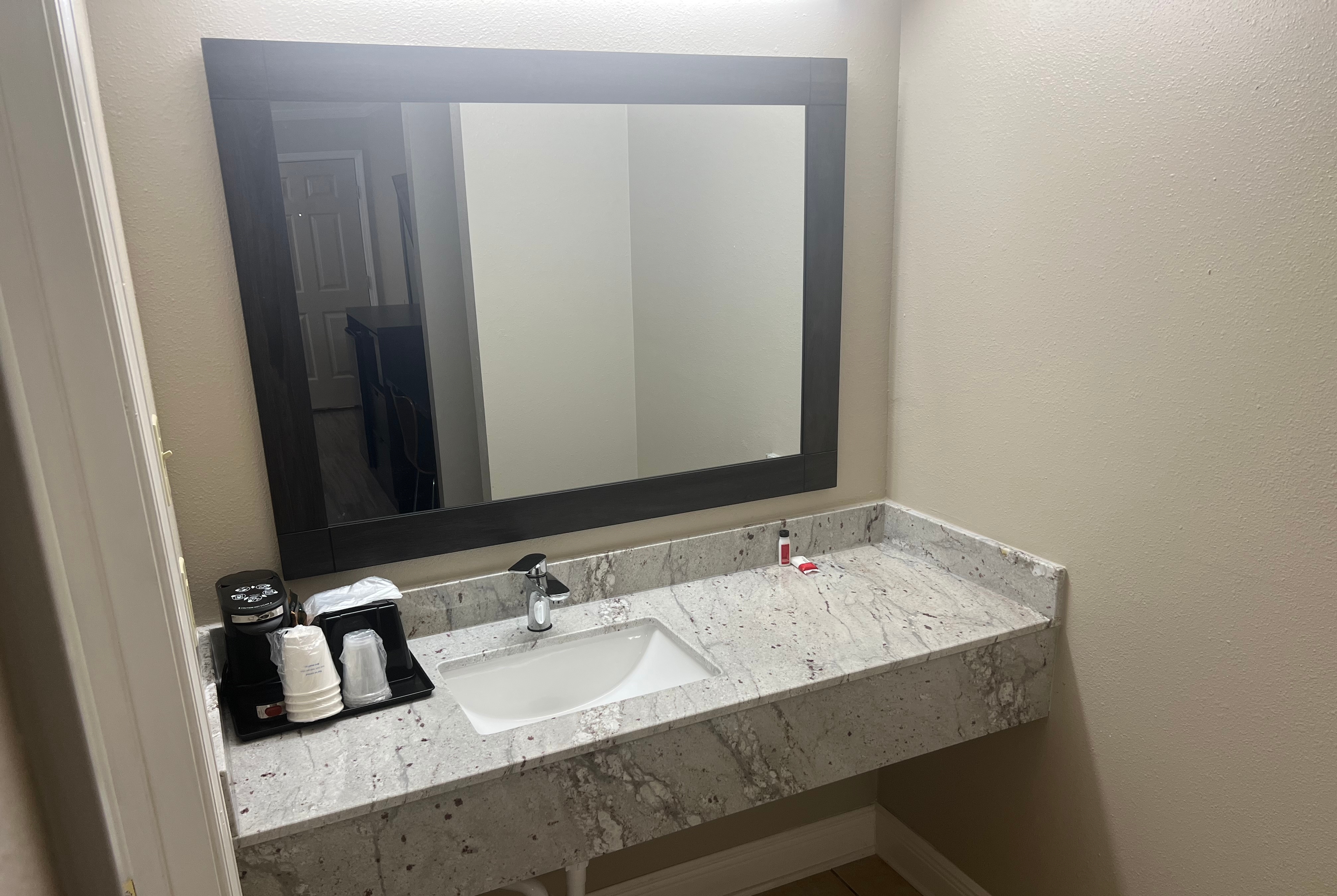 Guest room bath at the Super 8 by Wyndham Picayune in Picayune, Mississippi