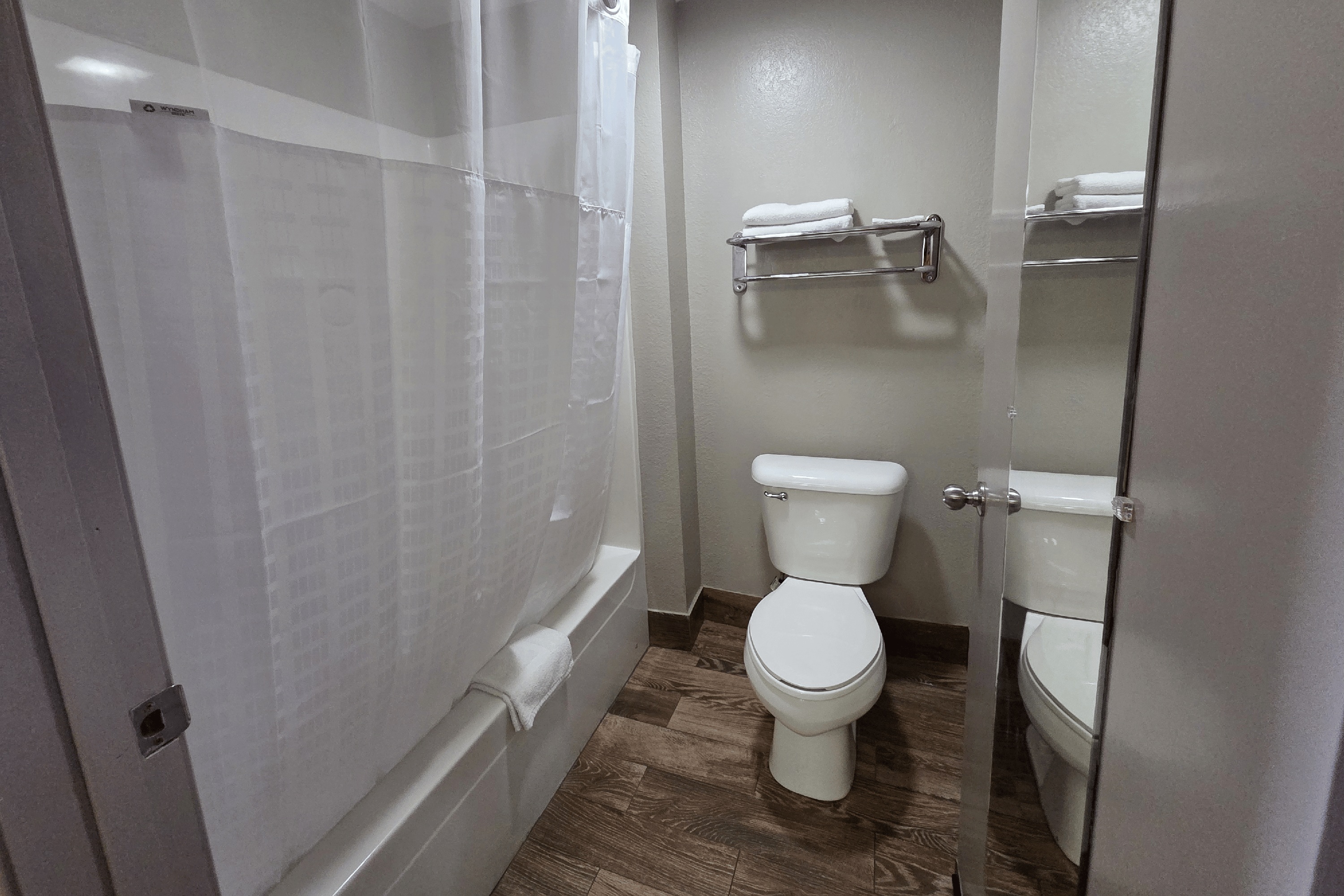 Guest room bath at the Super 8 by Wyndham Richland MS in Richland, Mississippi