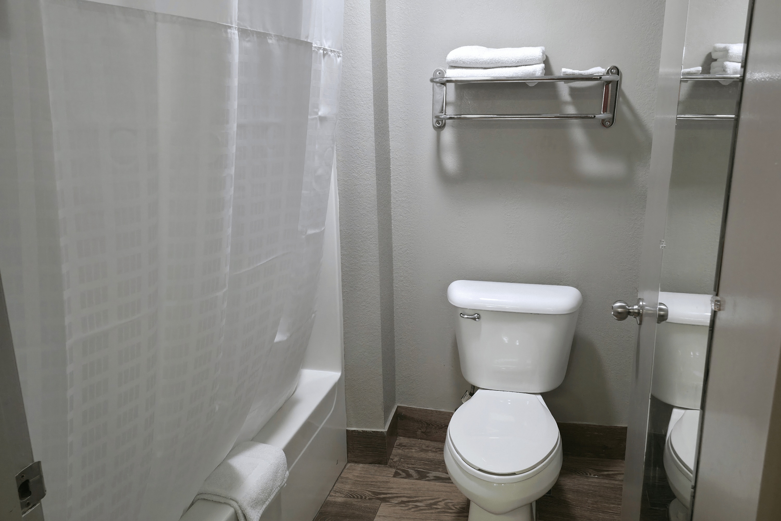 Guest room bath at the Super 8 by Wyndham Richland MS in Richland, Mississippi