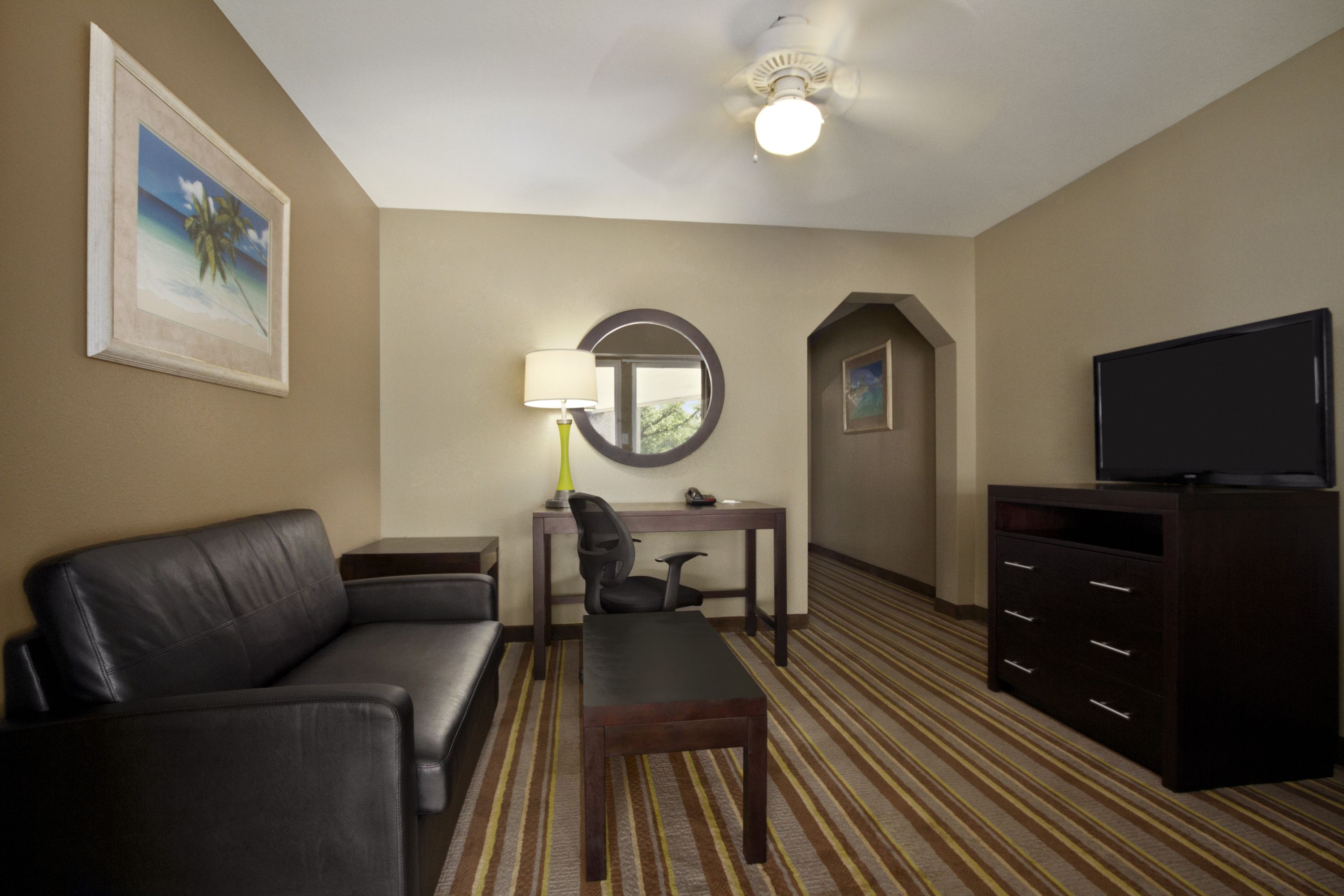 Guest room at the Super 8 by Wyndham Tupelo Airport in Tupelo, Mississippi