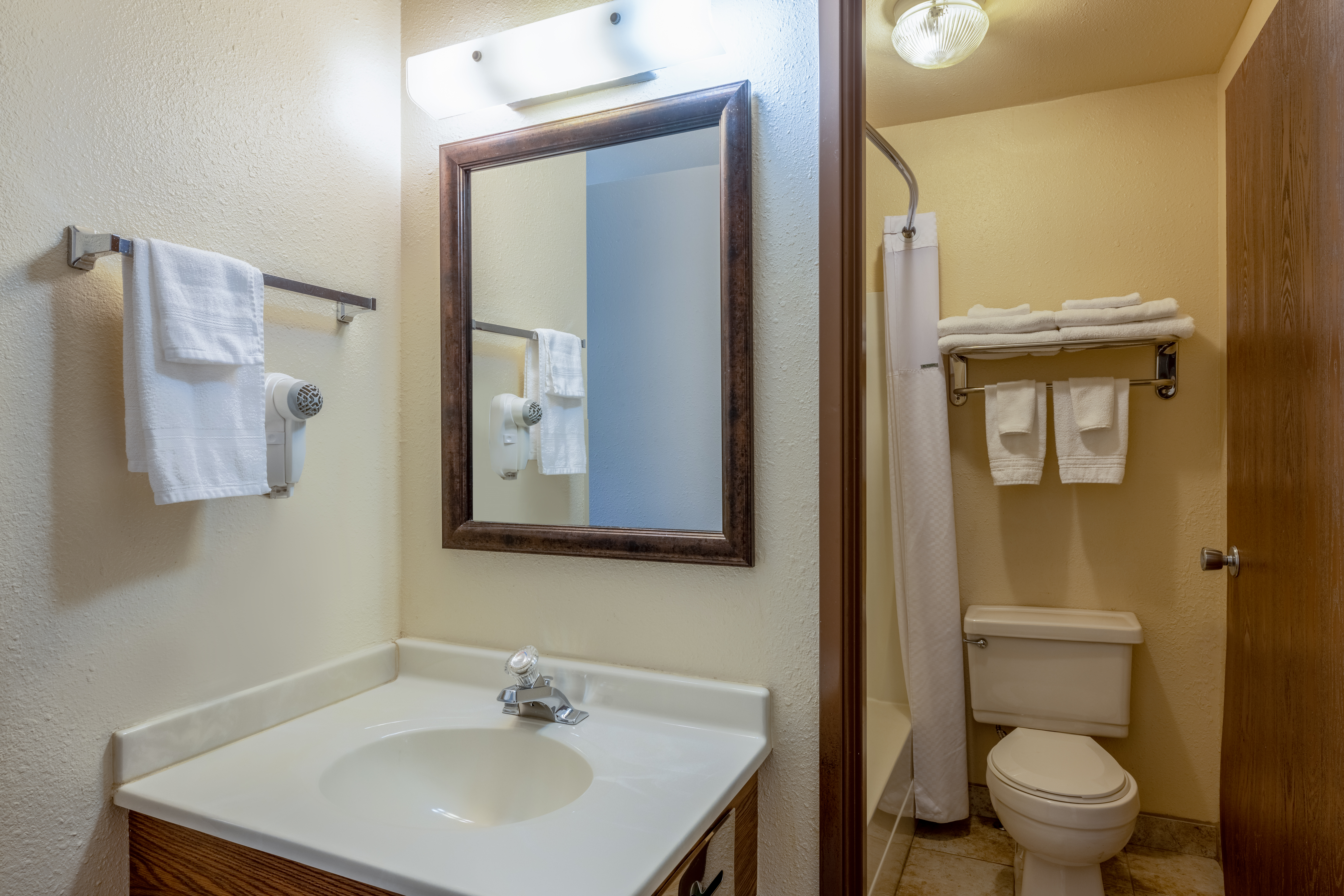 Guest room bath at the Super 8 by Wyndham Butte MT in Butte, Montana