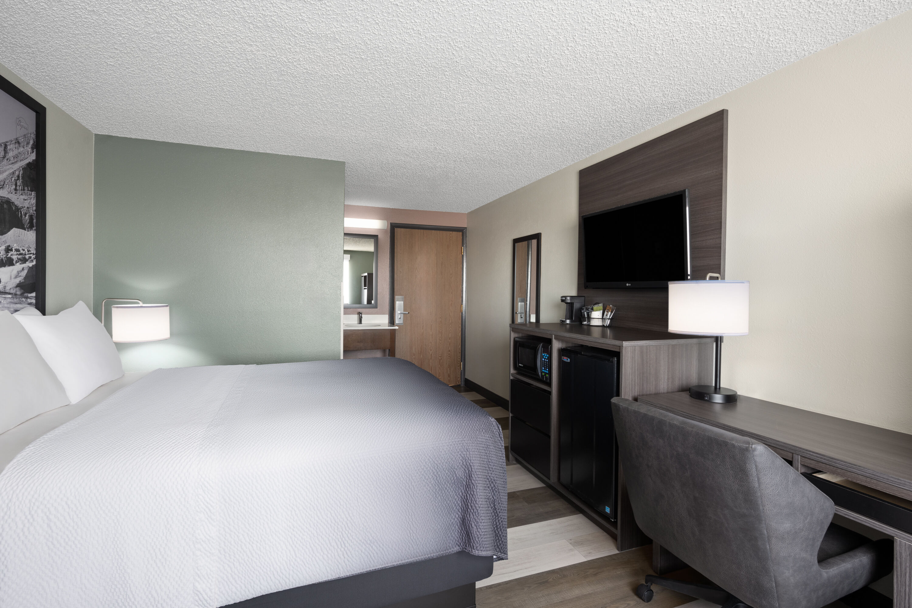 Guest room at the Super 8 by Wyndham Conrad in Conrad, Montana