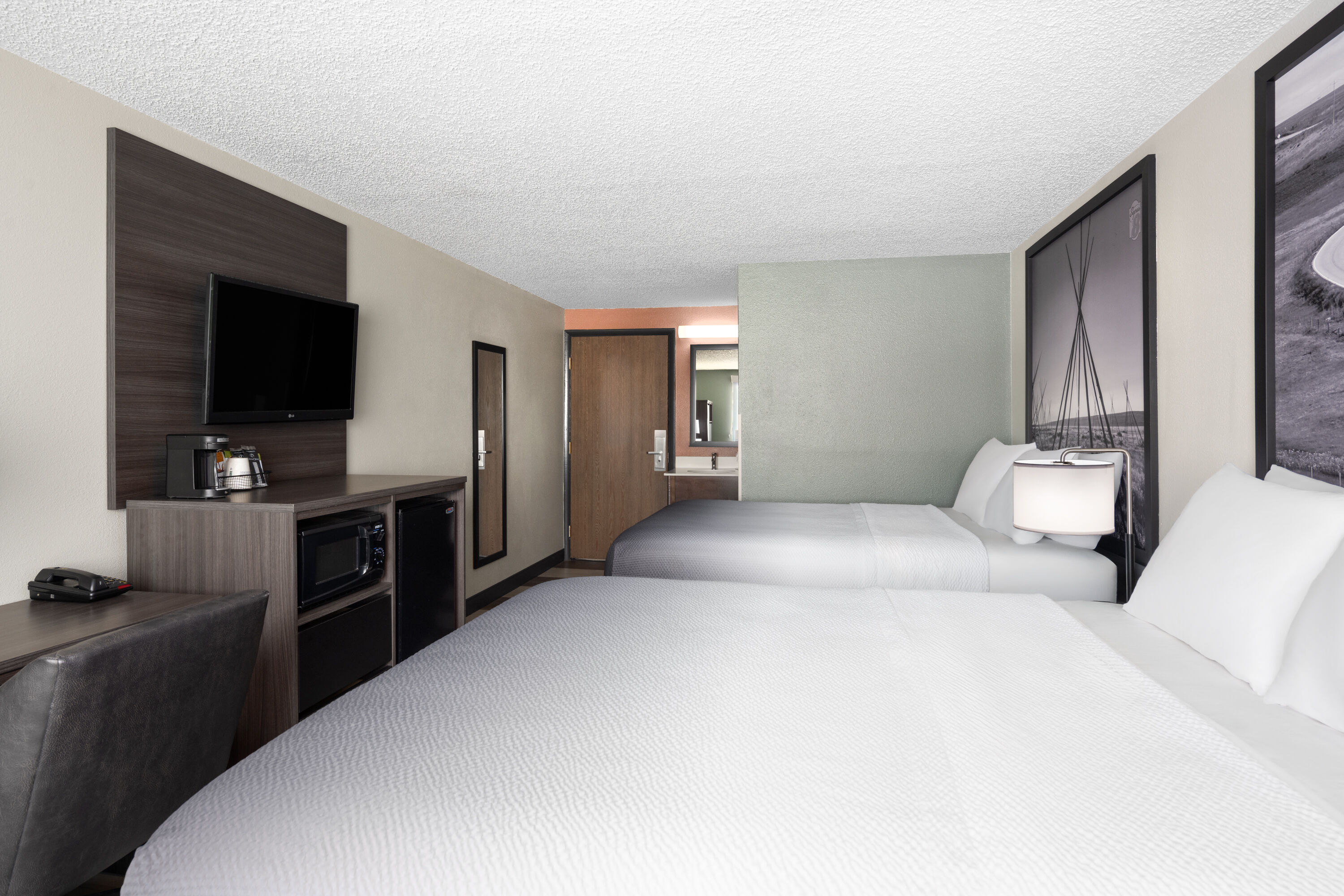 Guest room at the Super 8 by Wyndham Conrad in Conrad, Montana