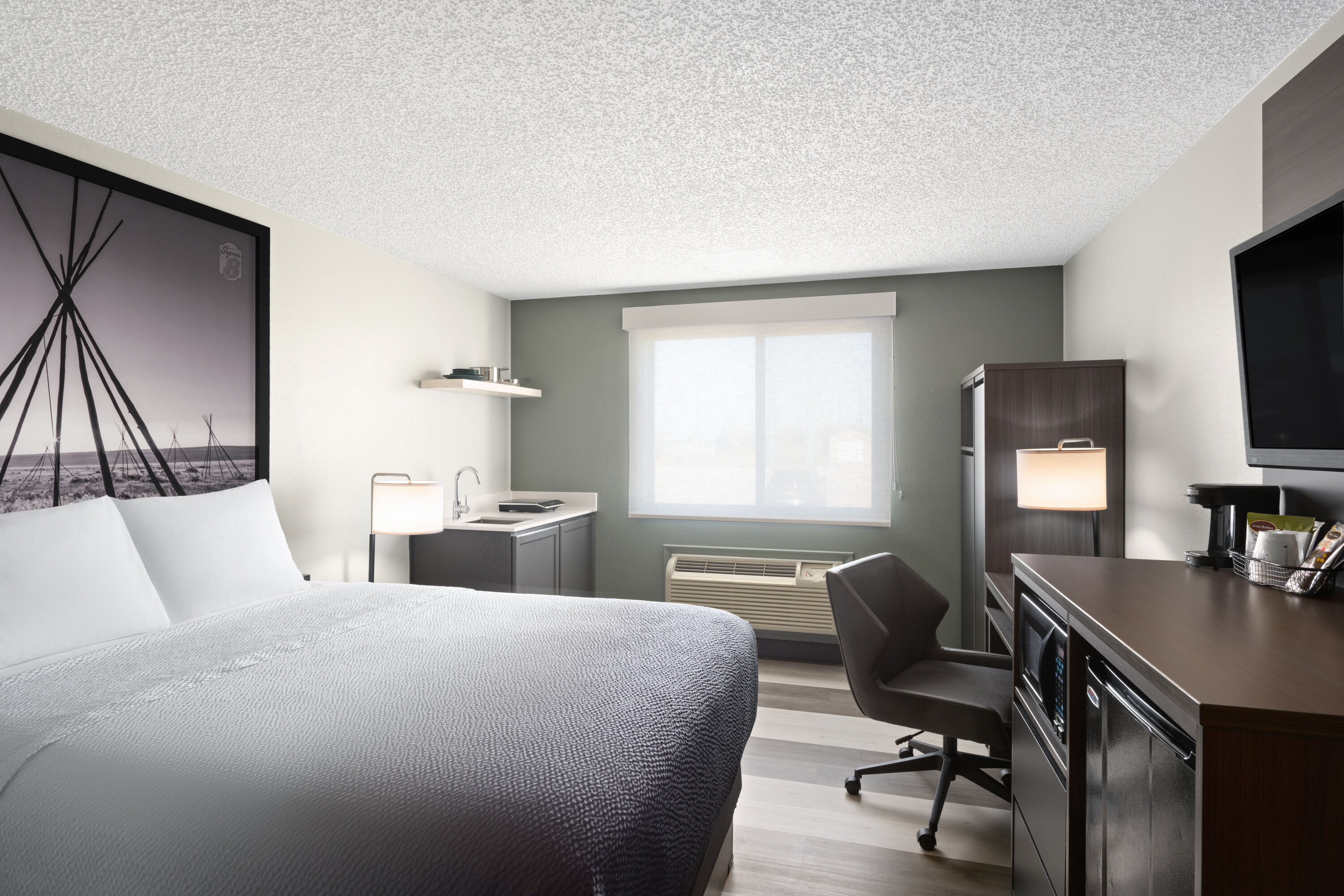 Guest room at the Super 8 by Wyndham Conrad in Conrad, Montana