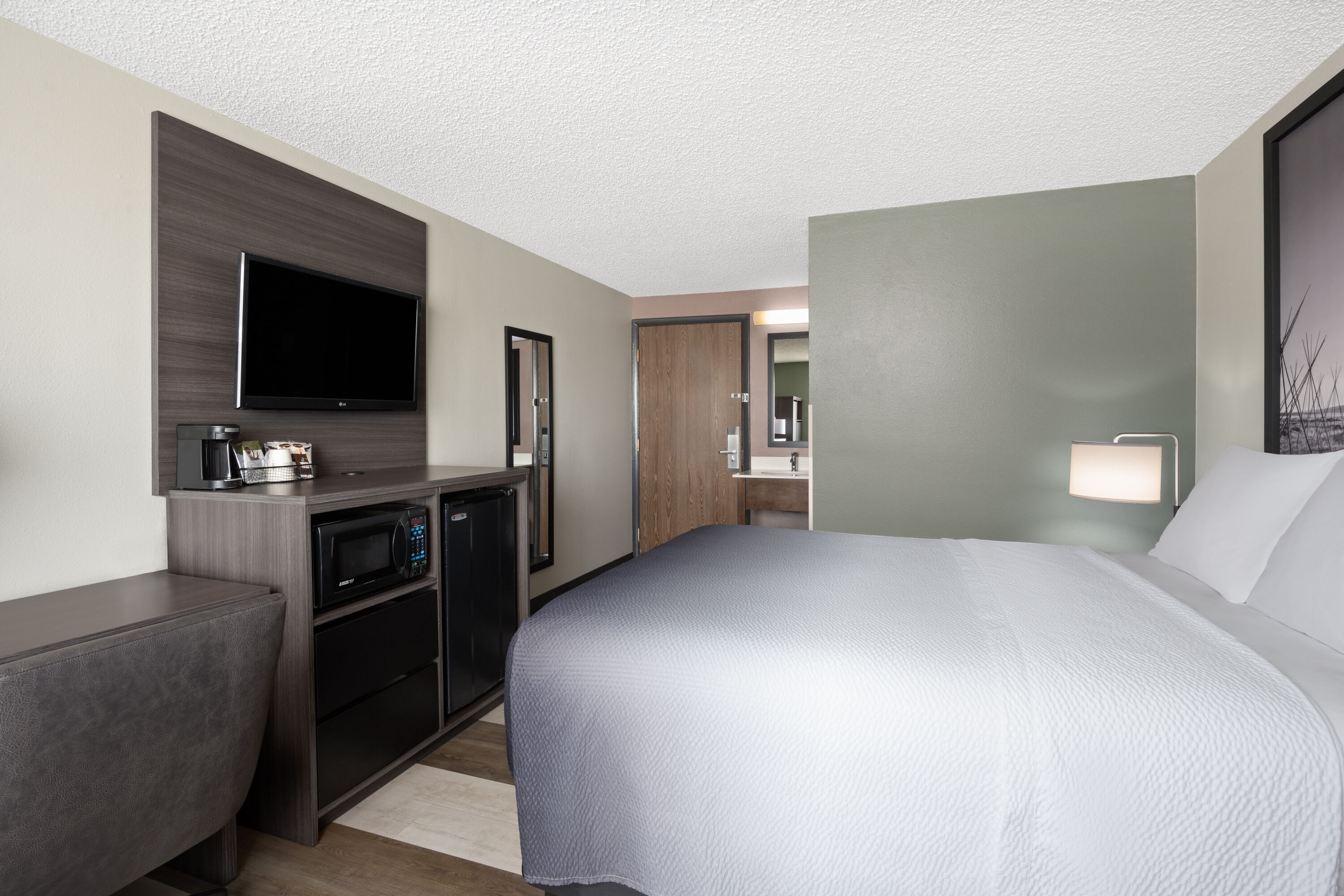 Guest room at the Super 8 by Wyndham Conrad in Conrad, Montana