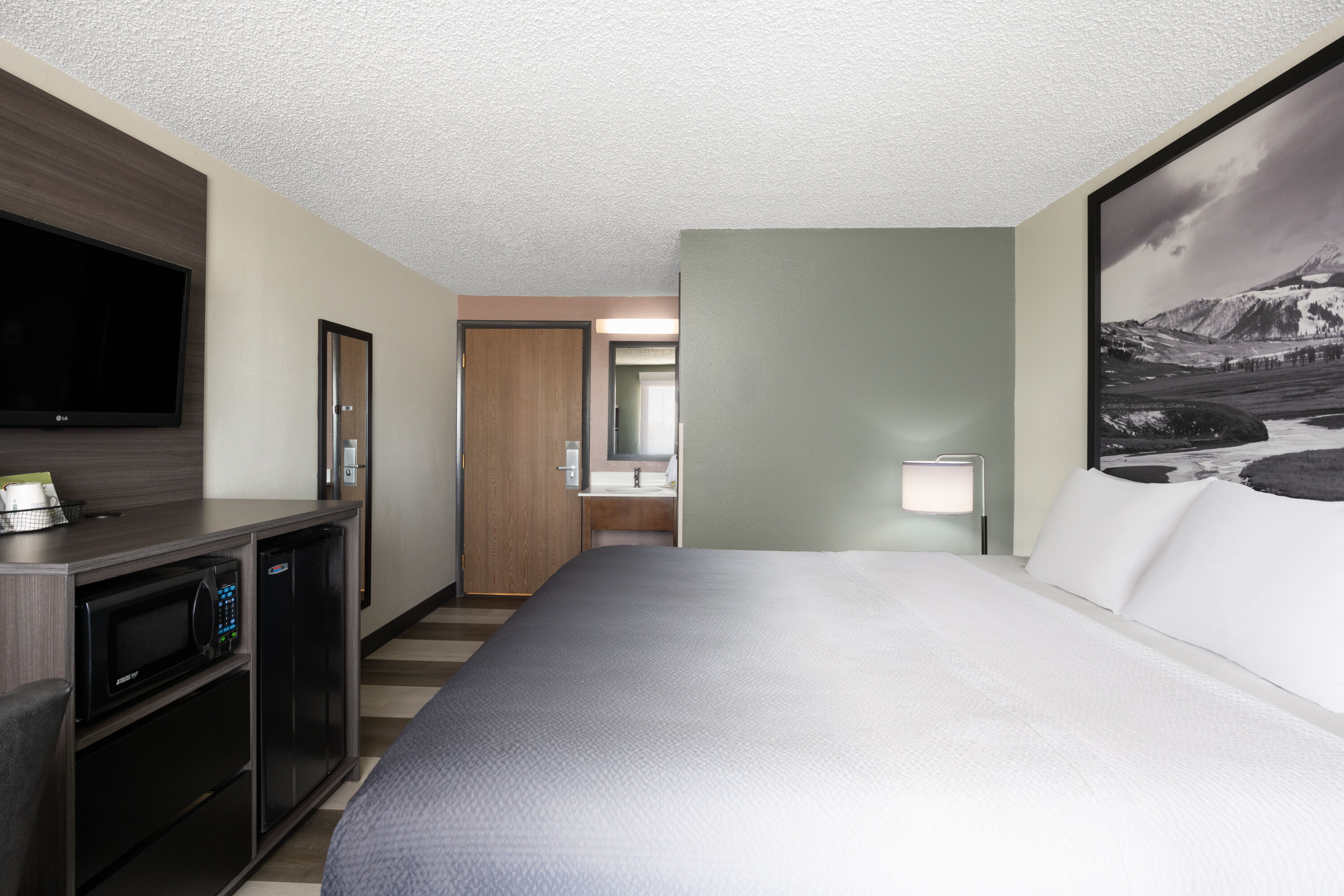 Guest room at the Super 8 by Wyndham Conrad in Conrad, Montana