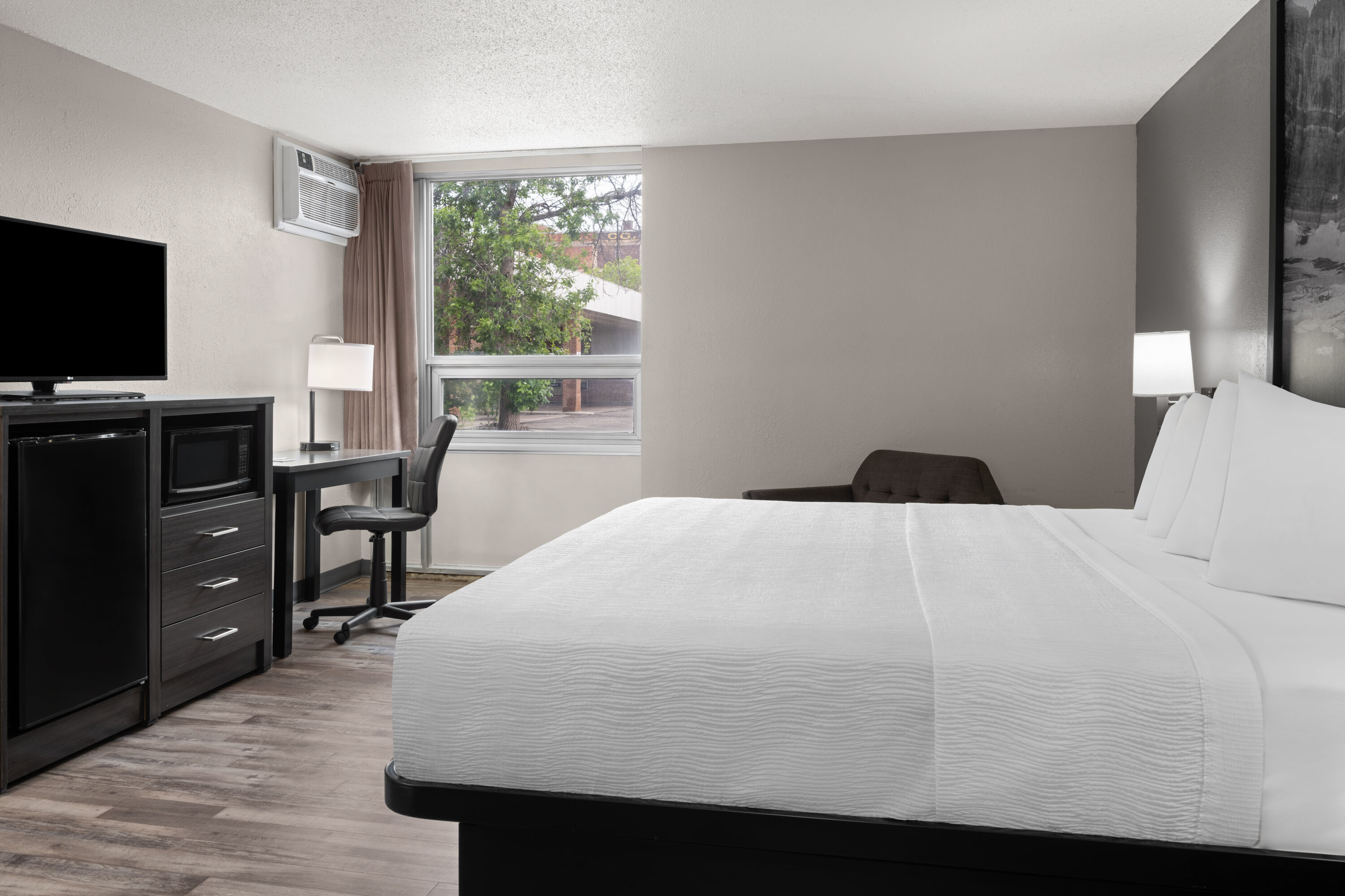 Guest room at the Super 8 by Wyndham Great Falls City Center in Great Falls, Montana